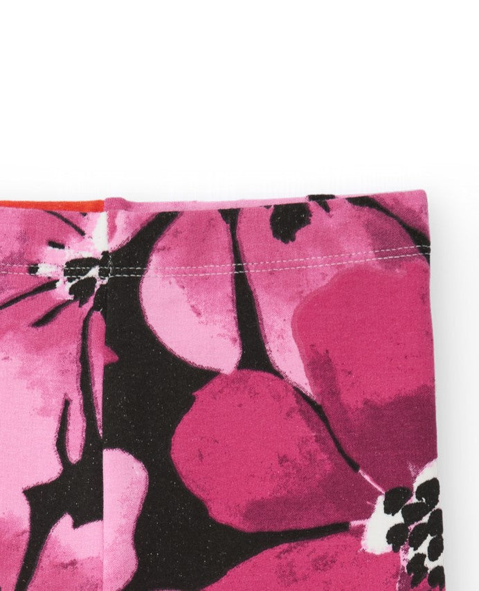 Leggings de niña con estampado floral en tonos fucsia y rojo