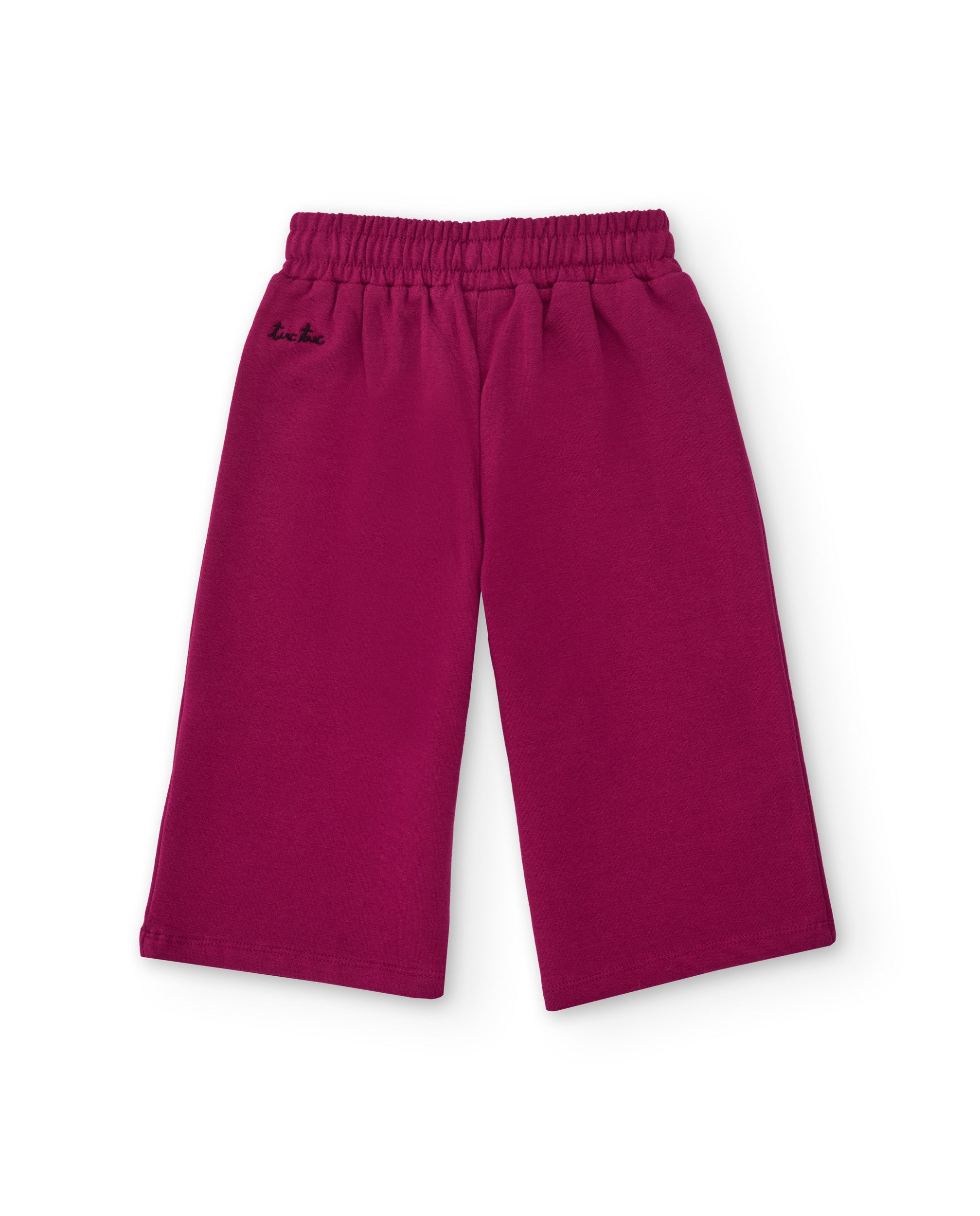Pantalón ancho de niña en color fucsia con lazo brillante