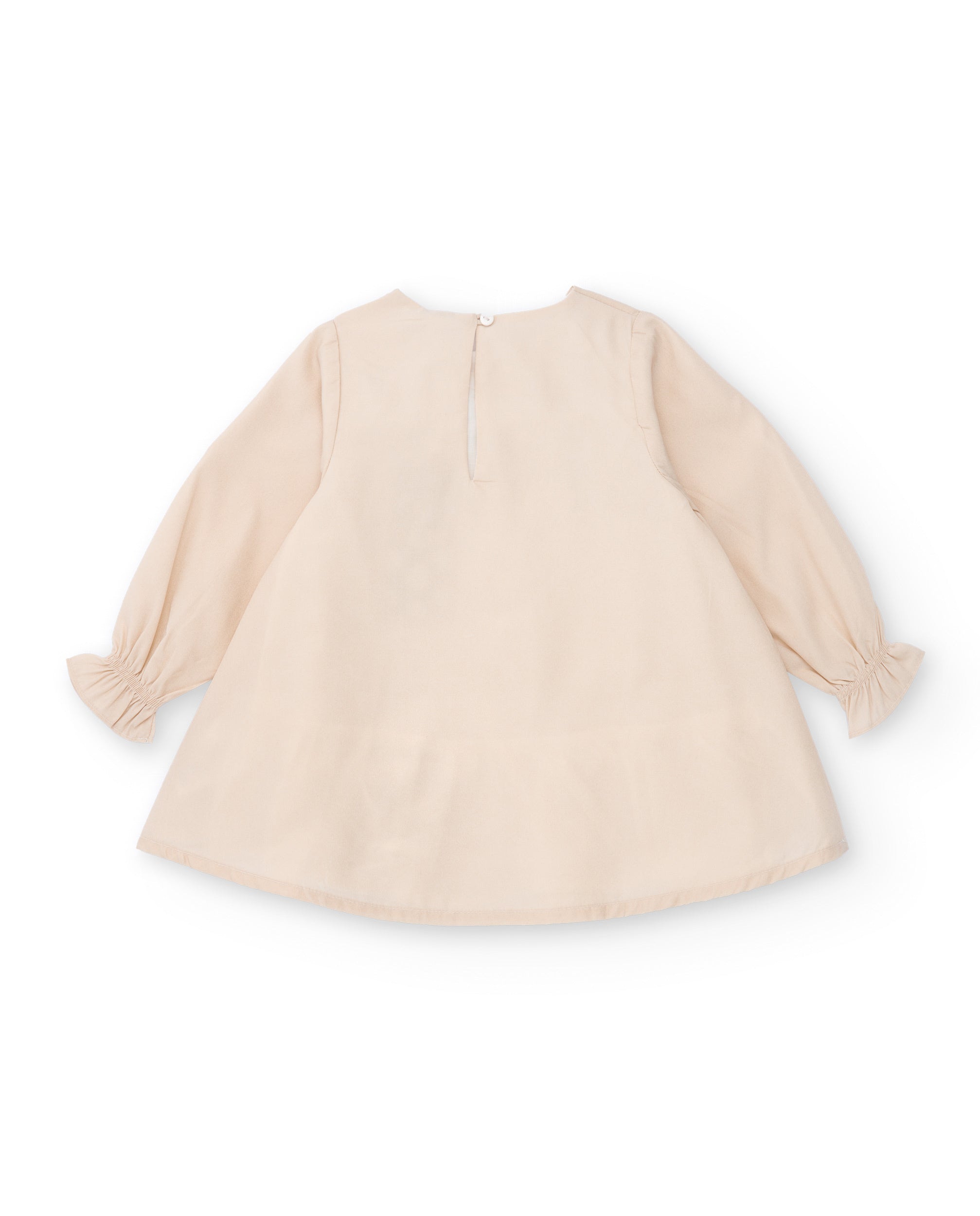 Vestido de niña en beige con lazo decorativo