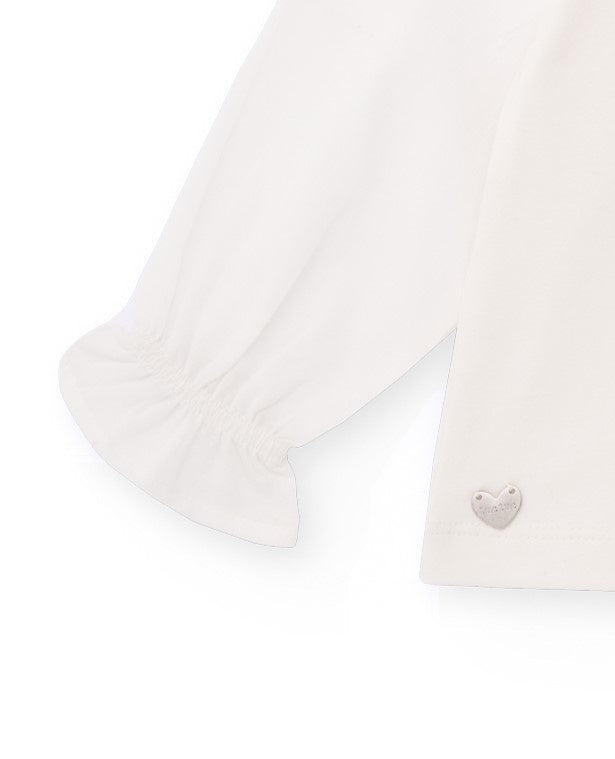 Camiseta de niña blanca con estampado de corazones