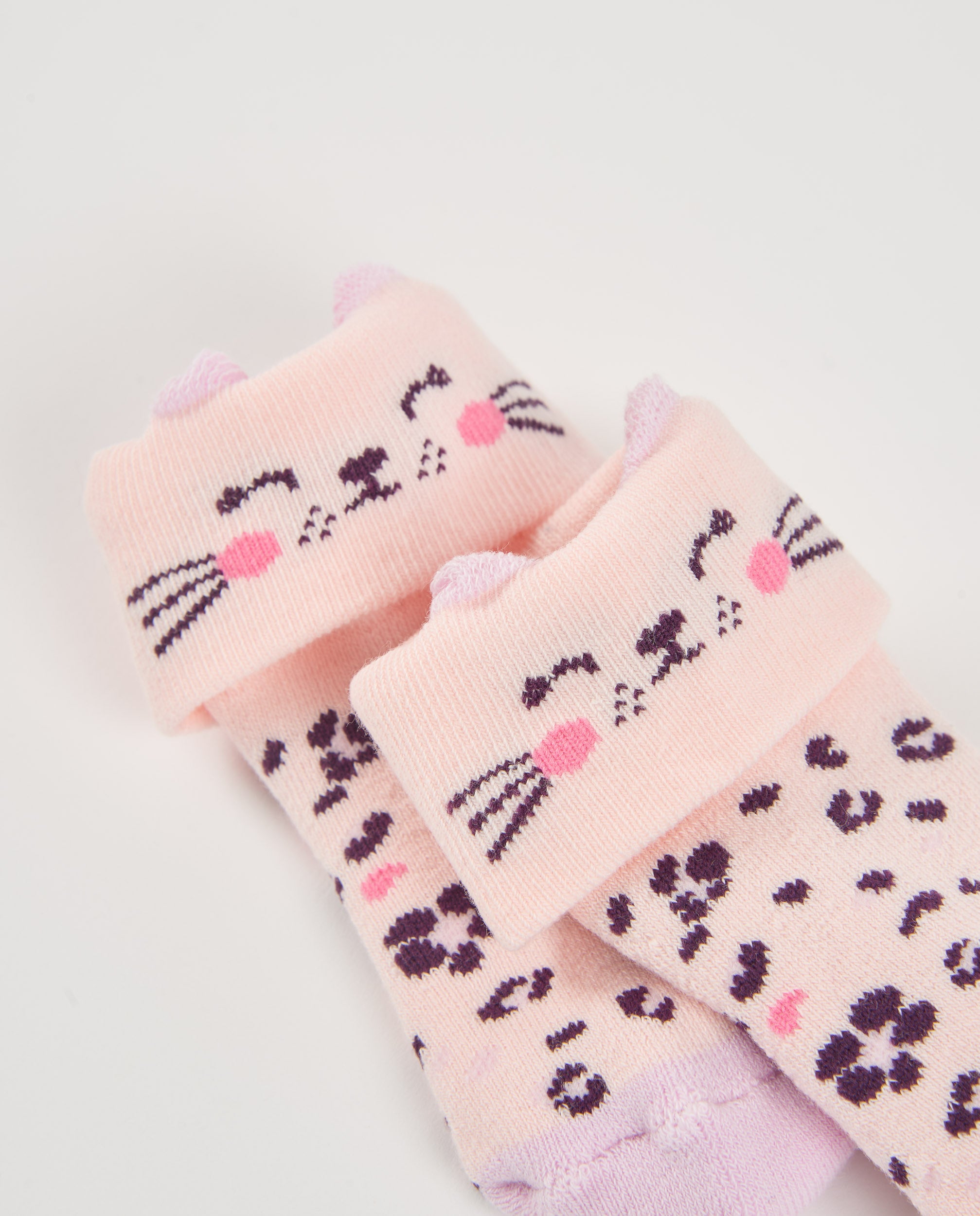 Calcetines de punto para recién nacido color rosa con diseño de