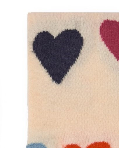 Bufanda para niña en beige con estampado de corazones y pompones