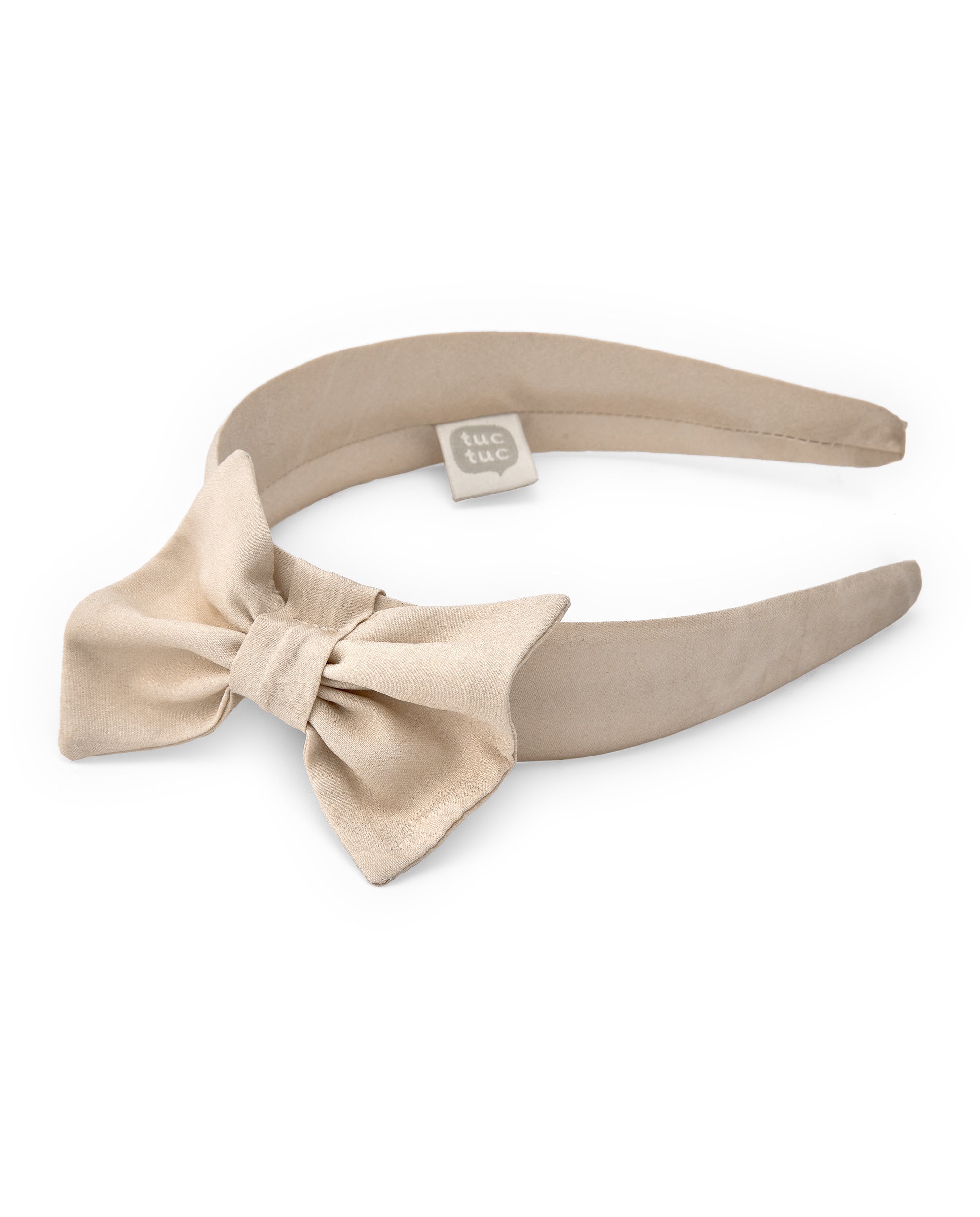 Diadema de niña en beige con gran lazo decorativo