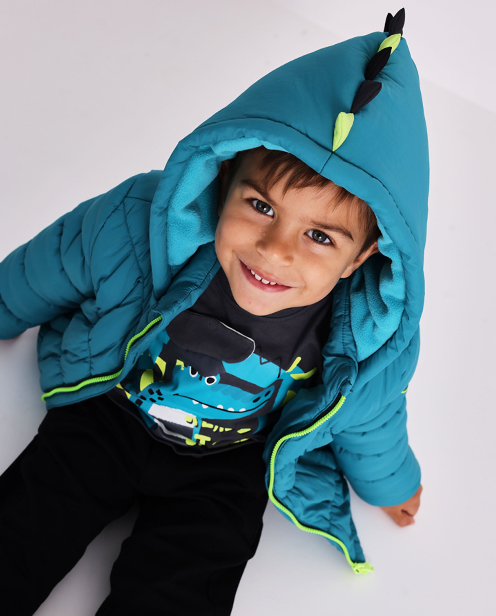 Abrigo acolchado para niño en azul petróleo con capucha y