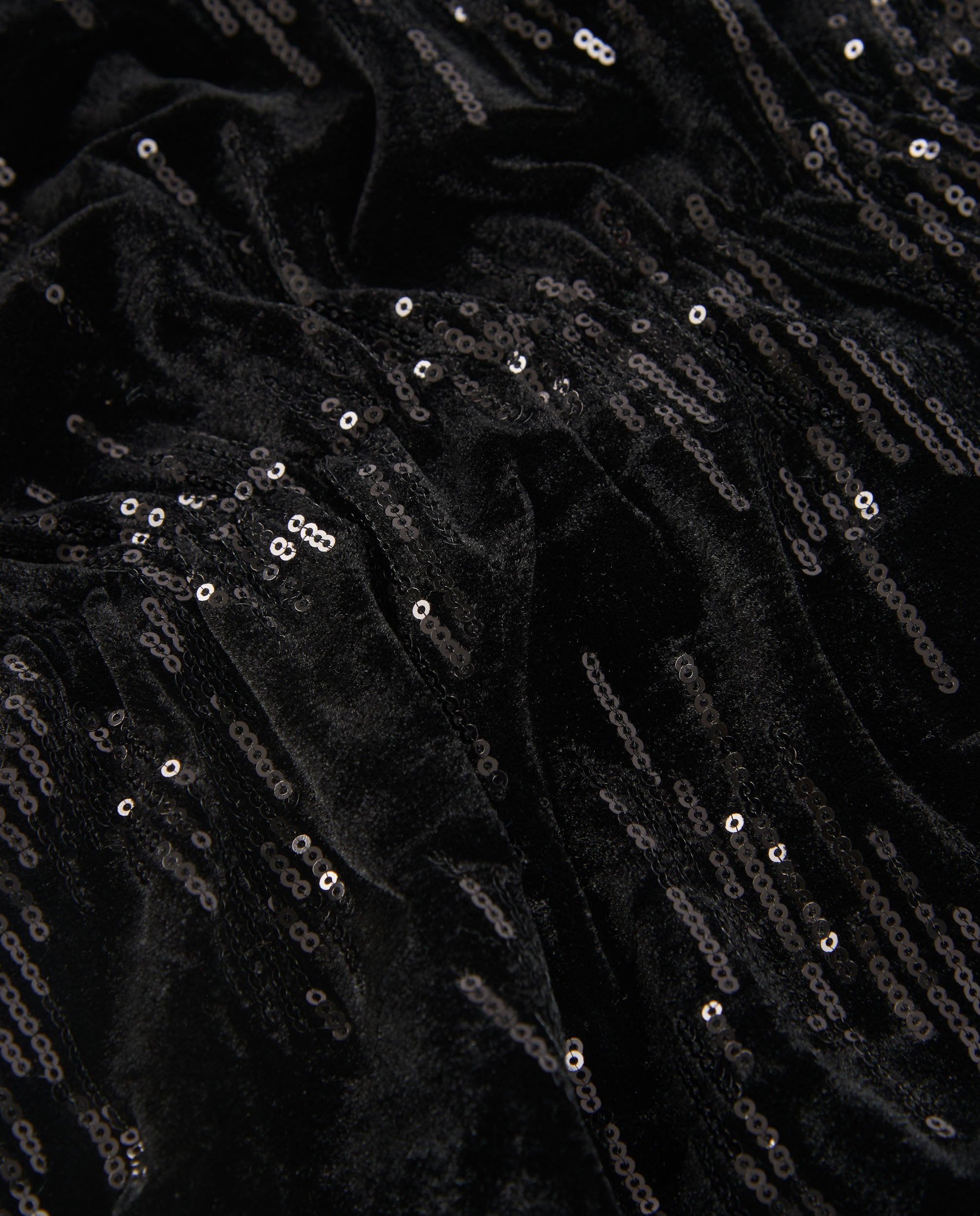 Vestido de niña en terciopelo negro con lentejuelas y manga