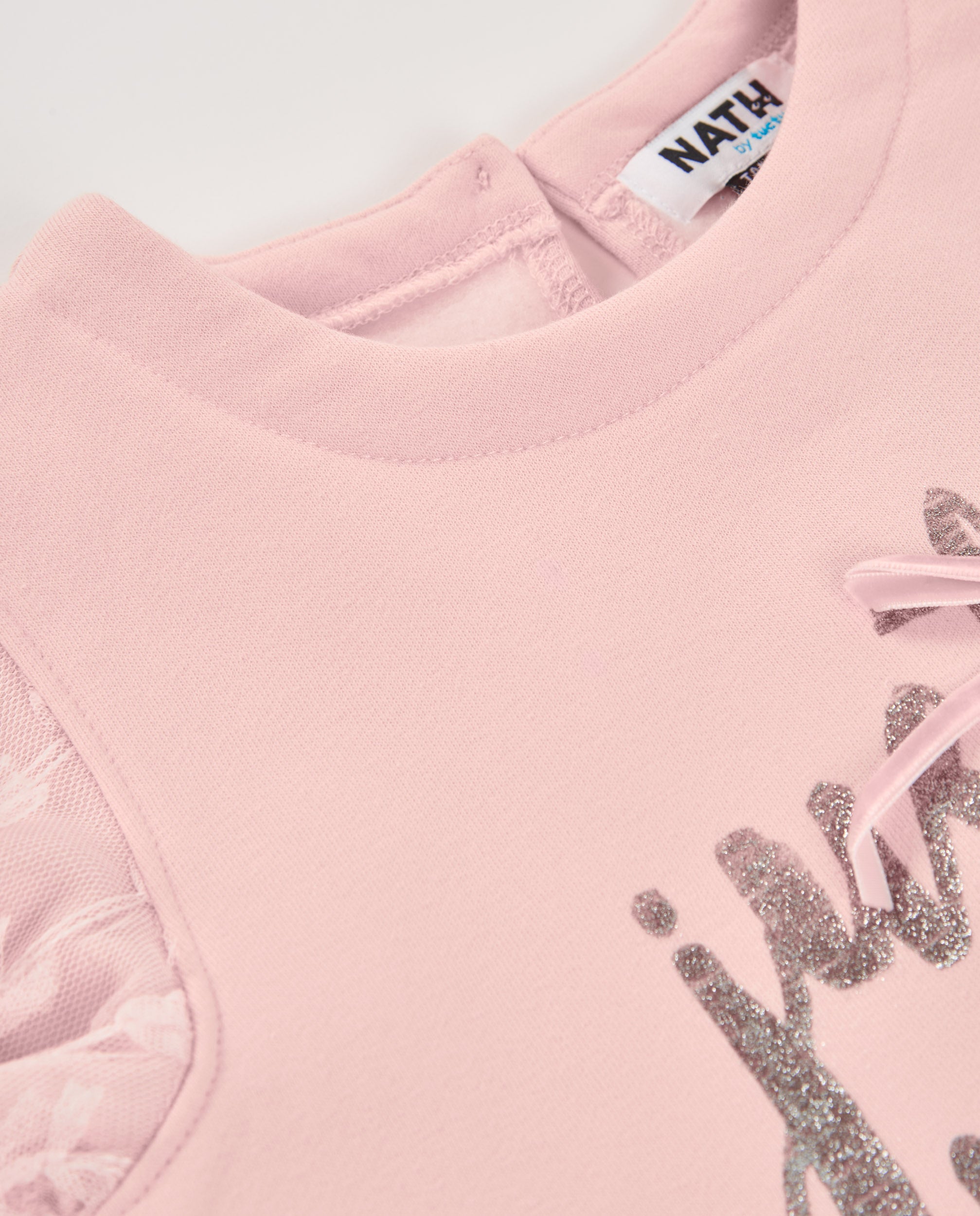 Vestido de niña en tul rosa con mensaje brillante