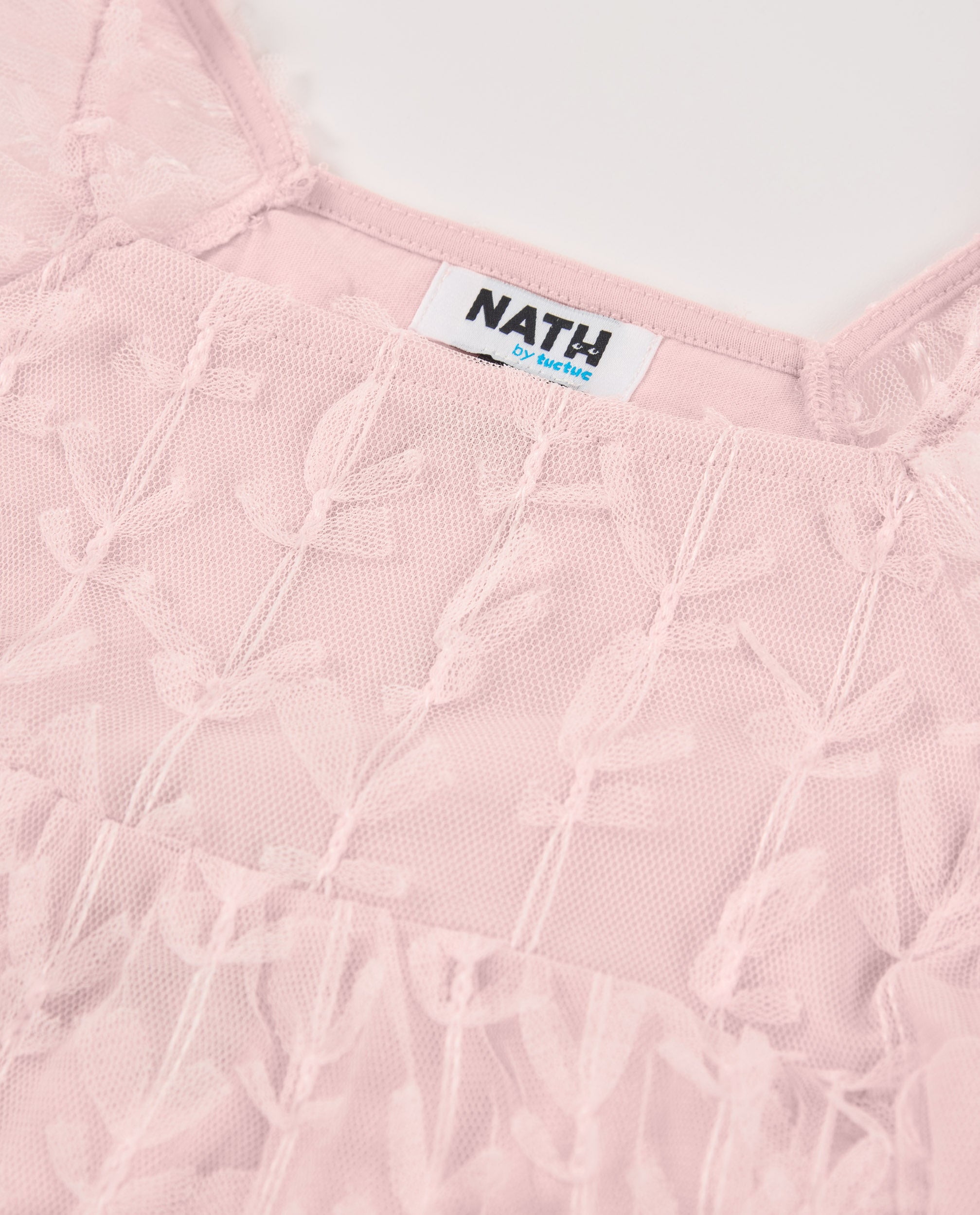 Blusa de niña en tul rosa con mangas abullonadas