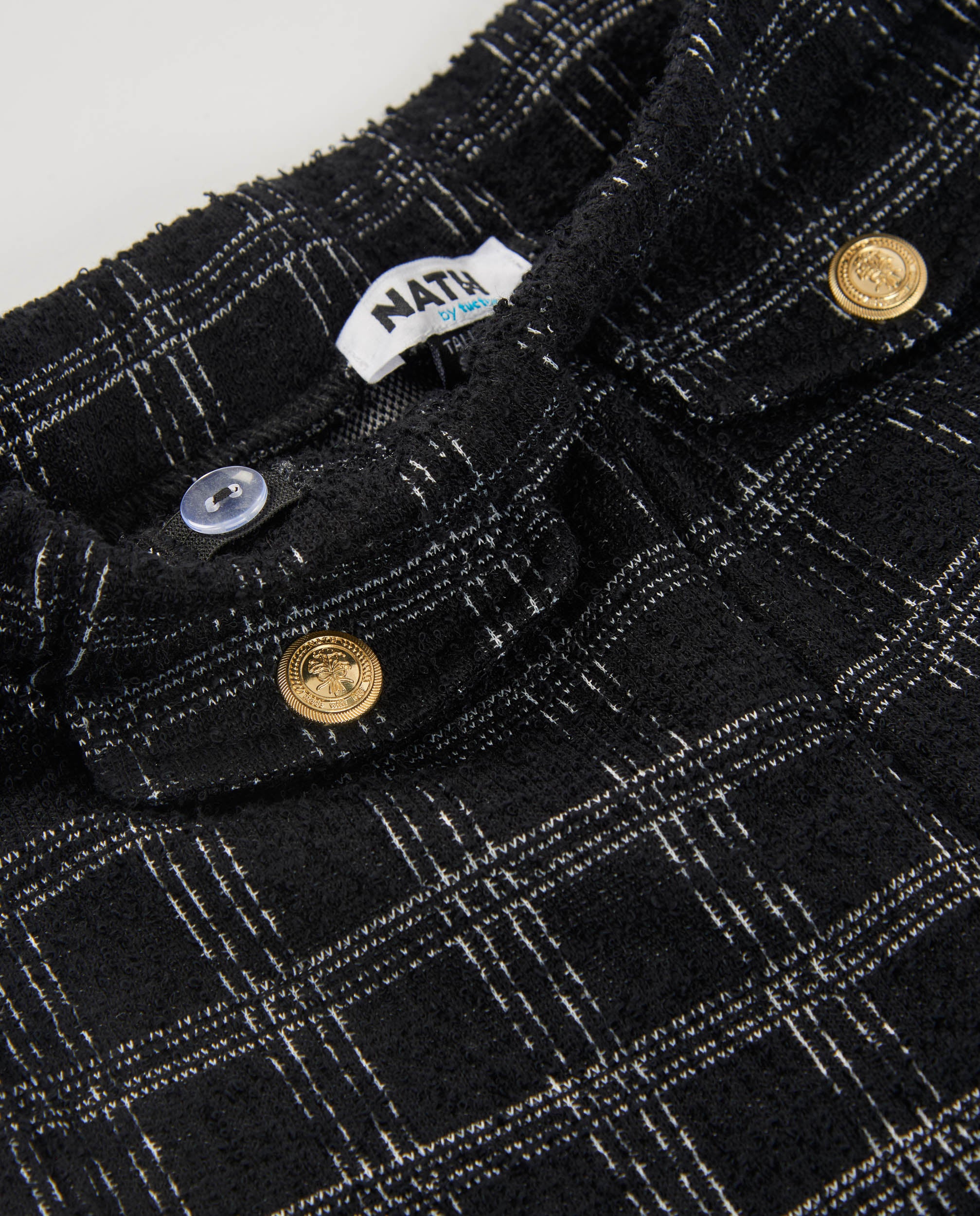 Pantalón de niña en tweed negro con cuadros grises