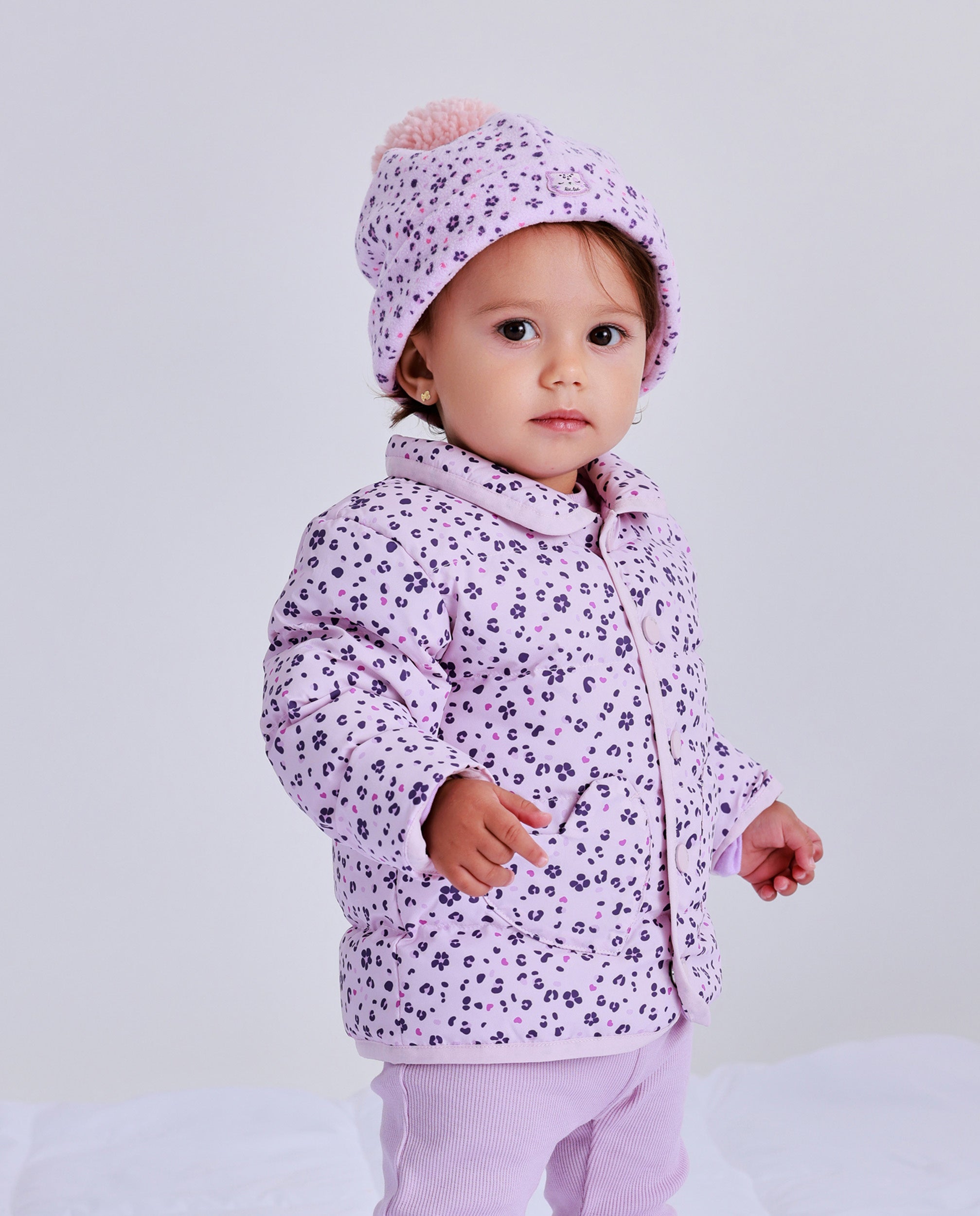 Parka acolchada para recién nacido color rosa con estampado de flores y corazones