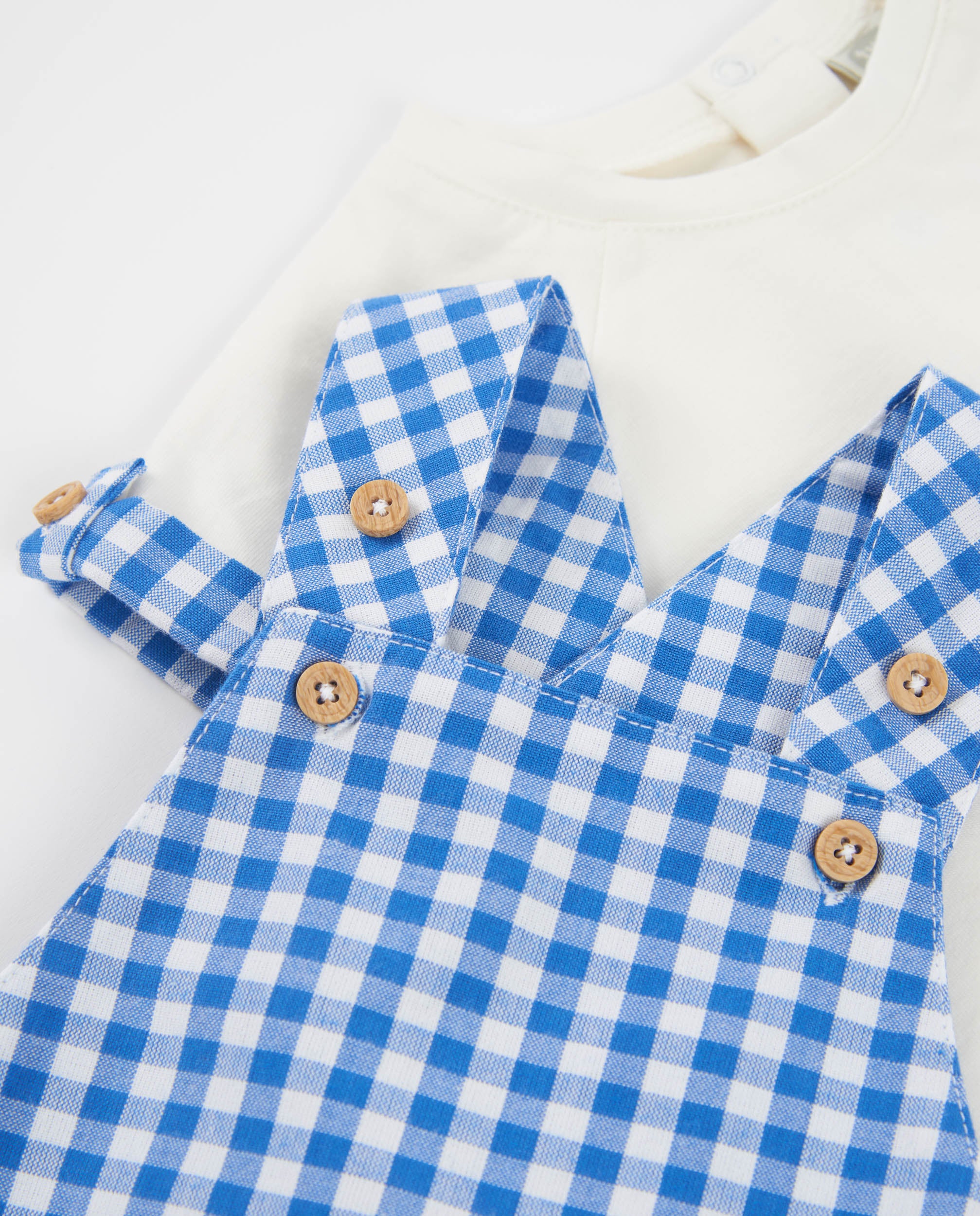 Conjunto de recién nacido de punto y bolsillos frontales
