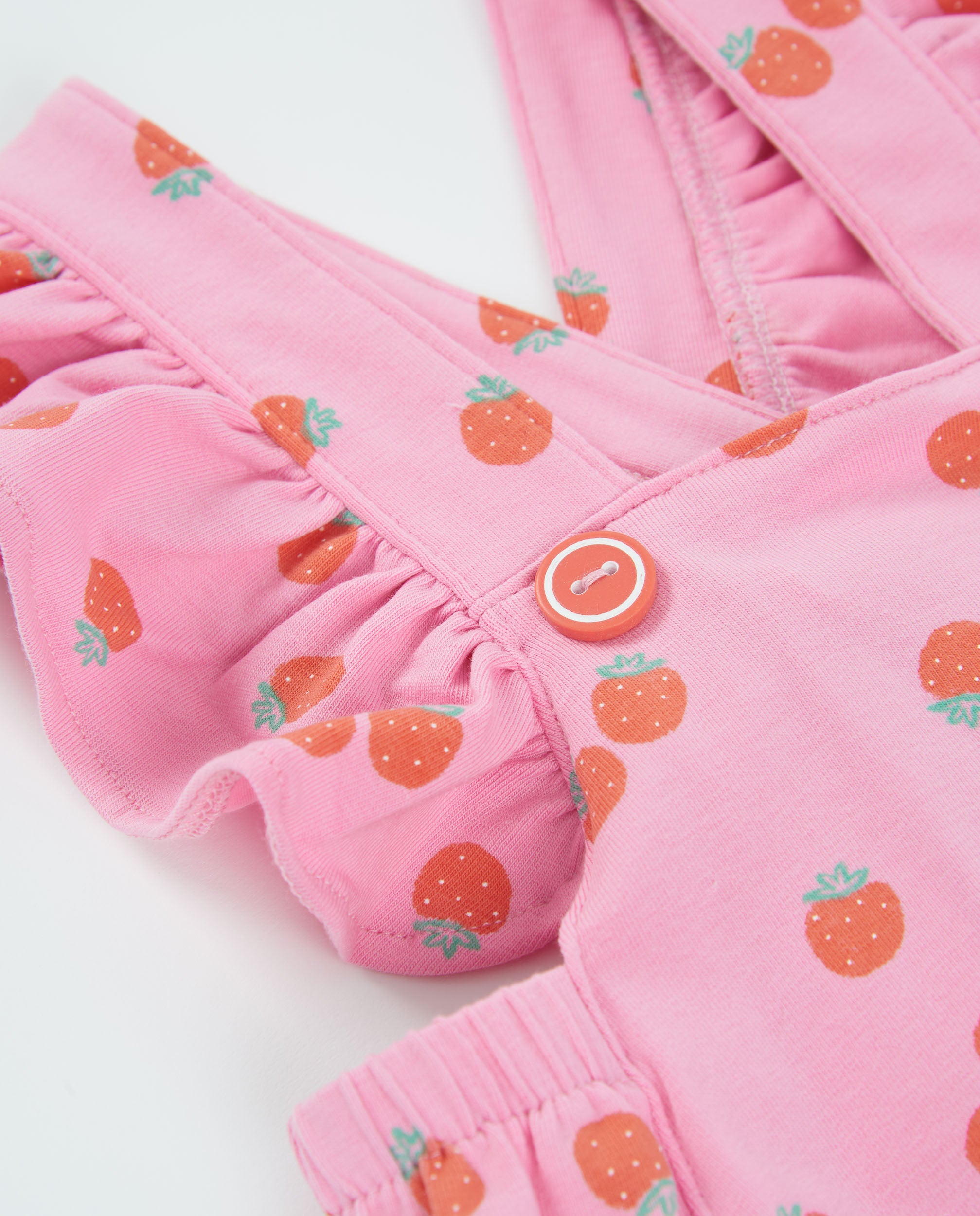 Peto de recién nacido de punto y estampado fresitas