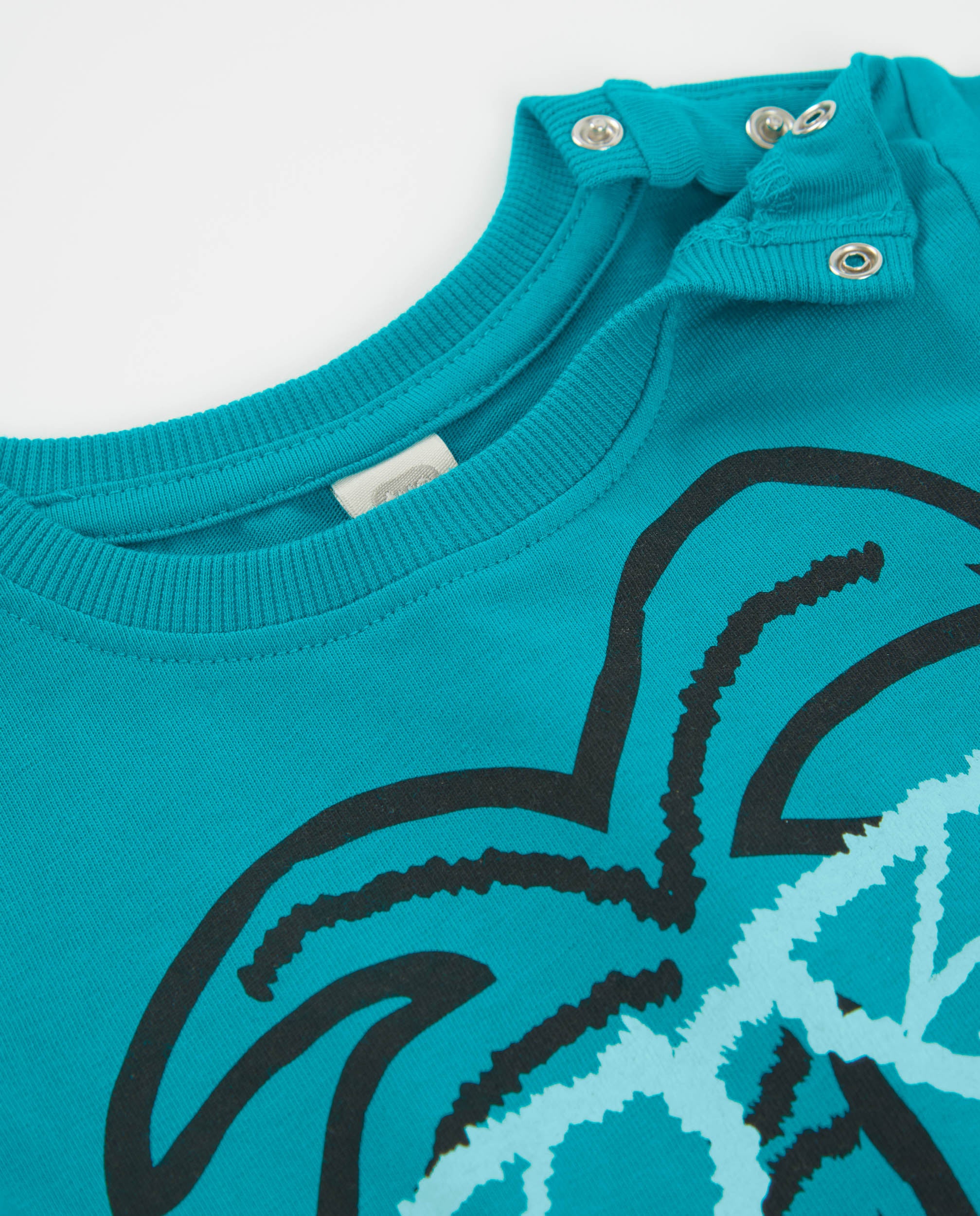 Camiseta de niño de punto y estampado palmeras