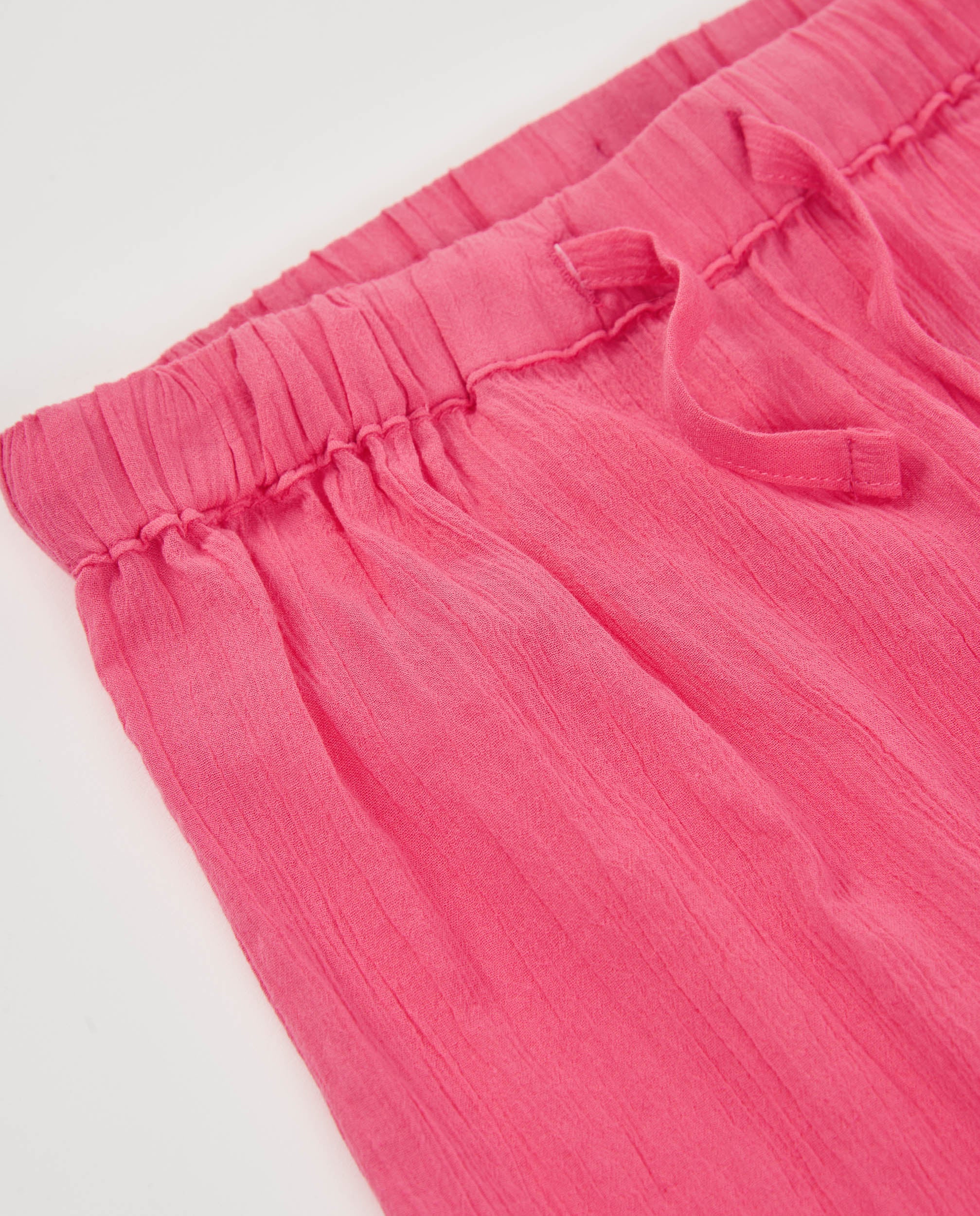 Pantalones de niña de plana y cinturilla elástica