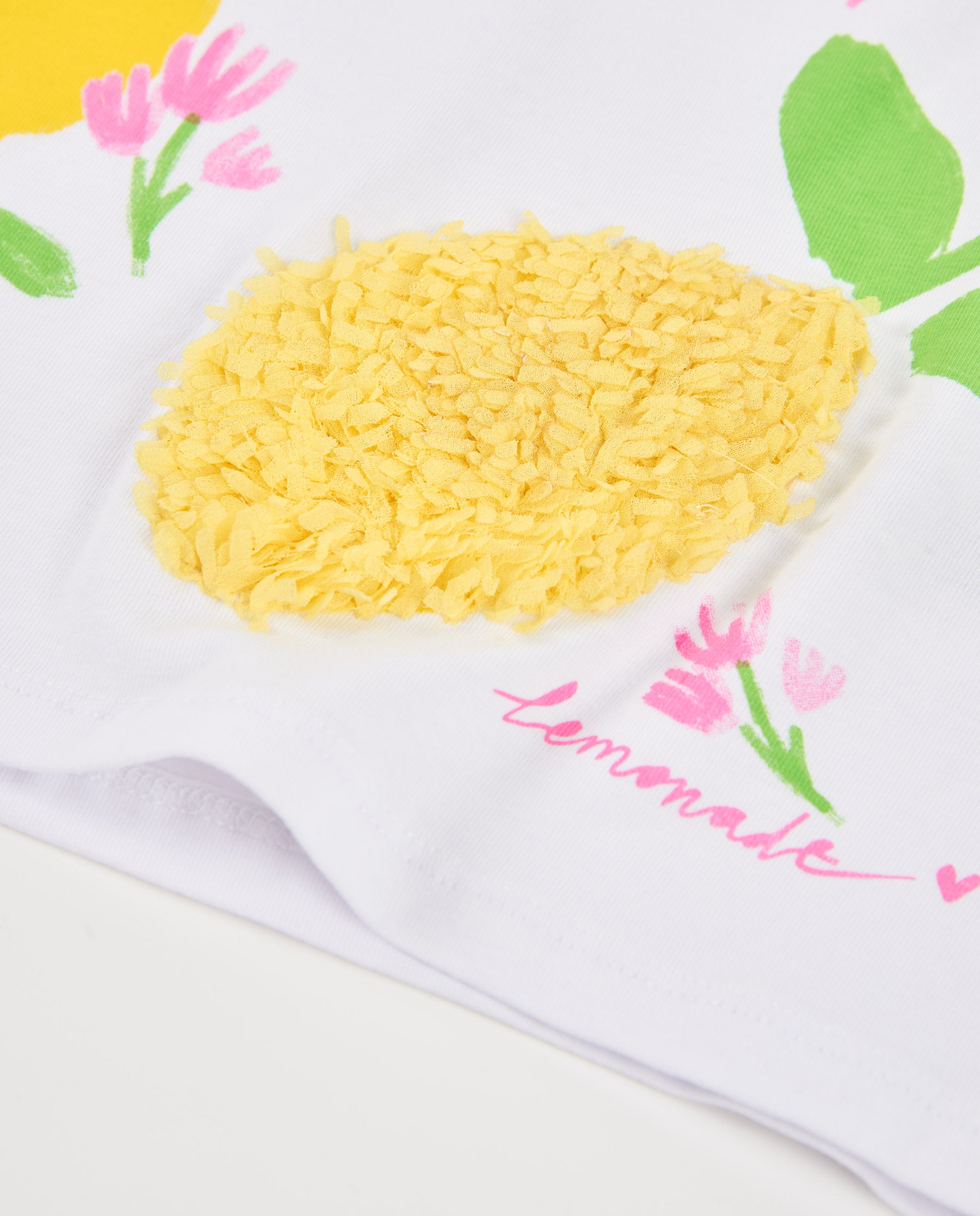 Camiseta de niña de punto con limón texturizado