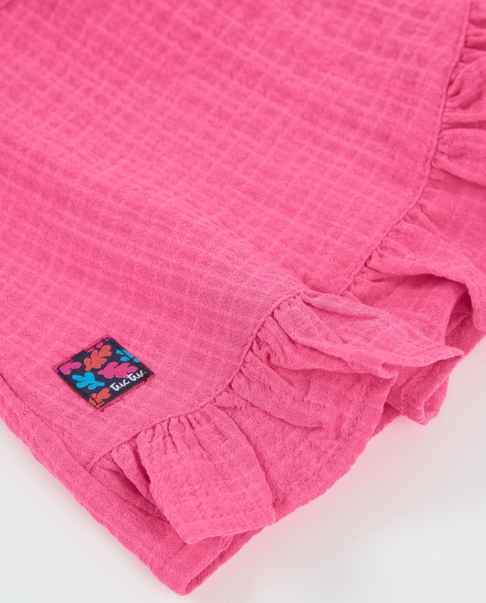 Falda de niña de plana y diseño cruzado