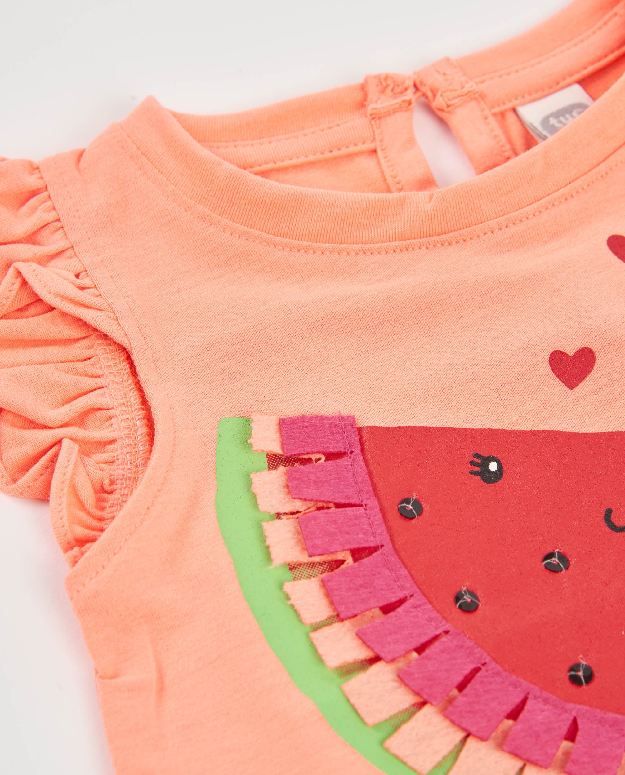 Camiseta de niña de punto y detalles brillantes