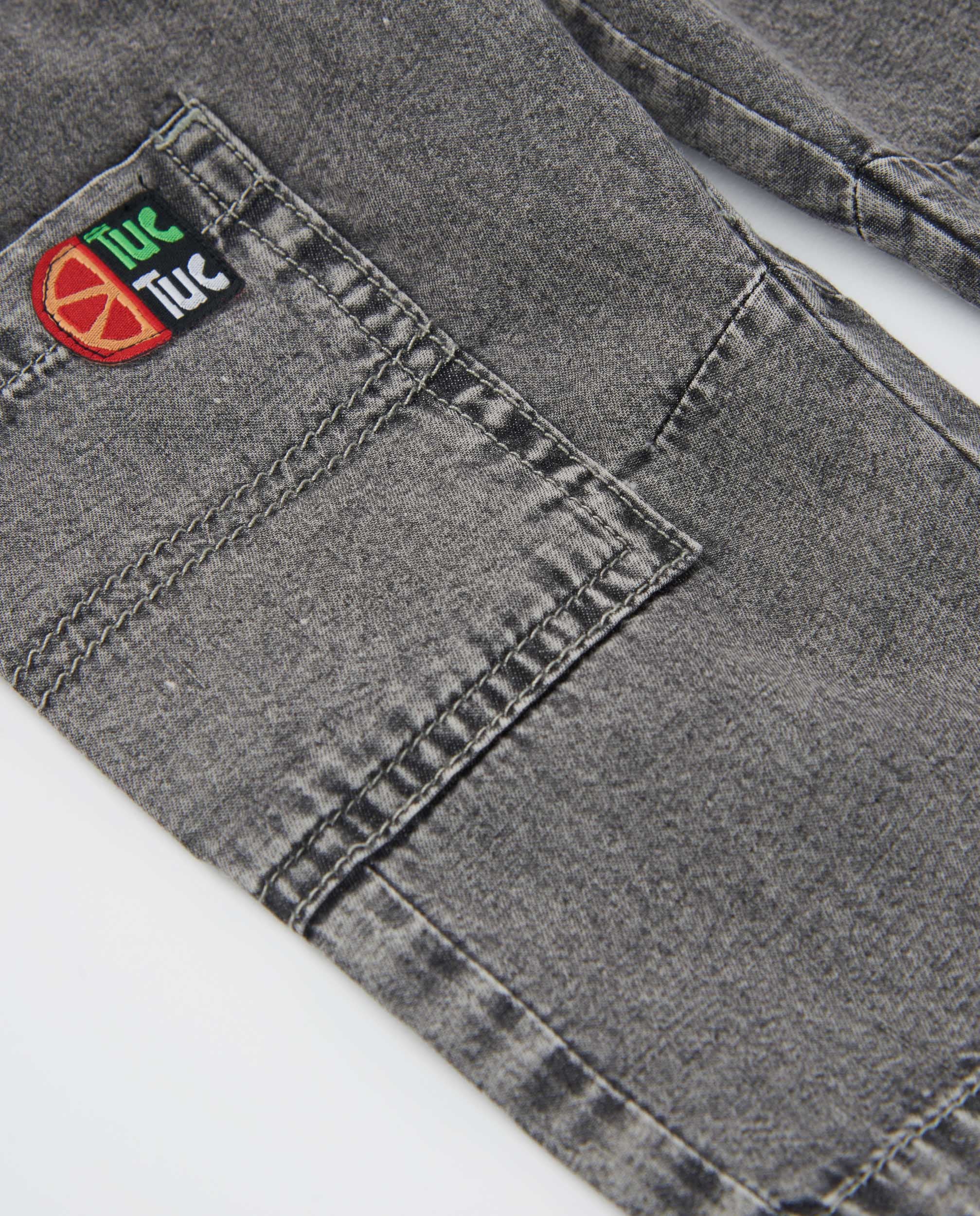 Pantalones de niño de plana y denim efecto lavado