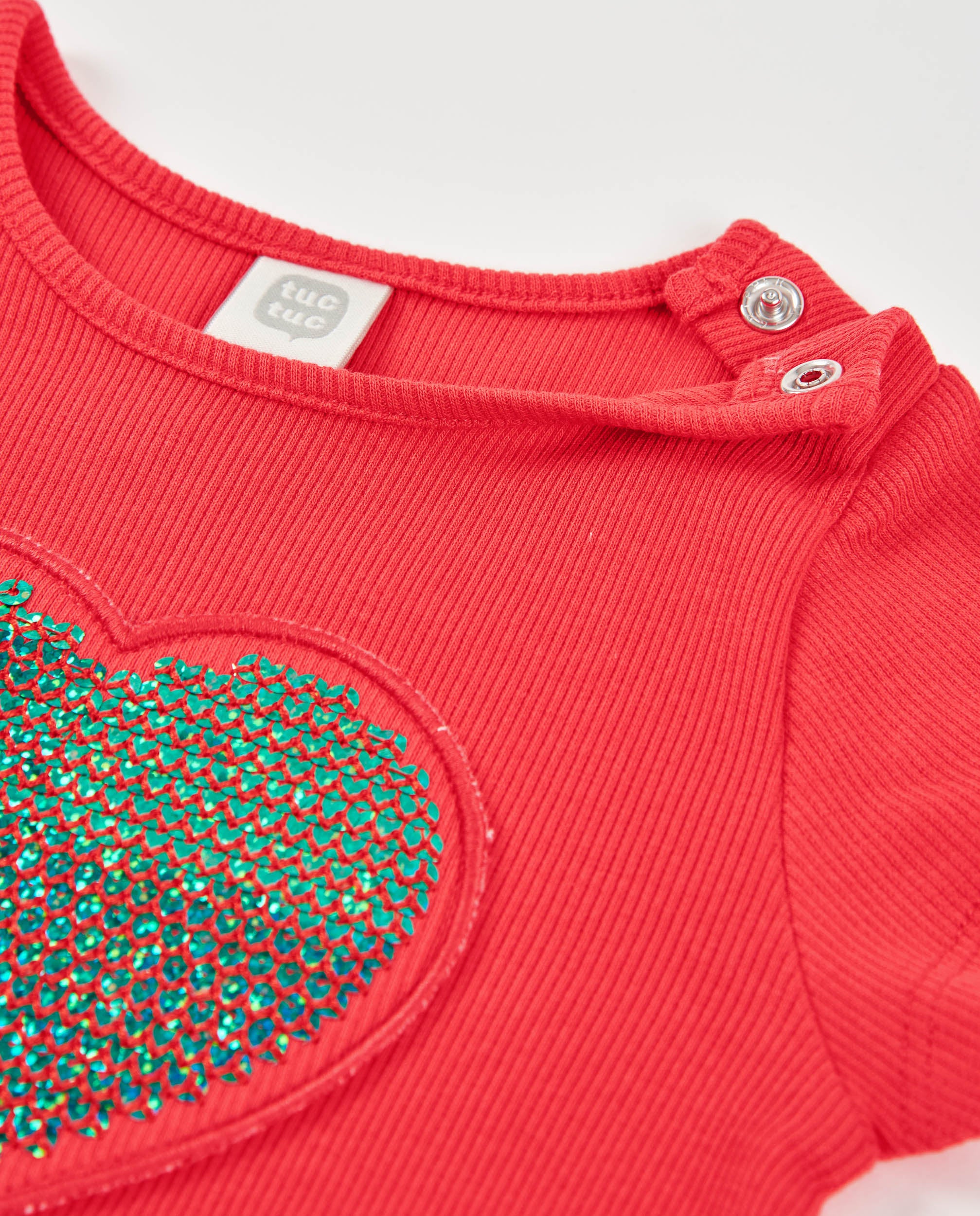 Vestido de niña de punto con corazón de lentejuelas