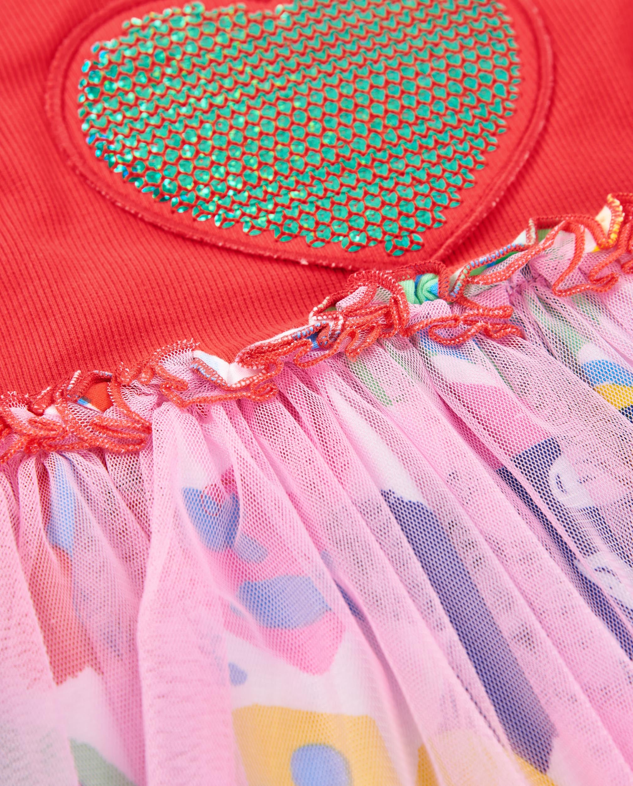 Vestido de niña de punto con corazón de lentejuelas