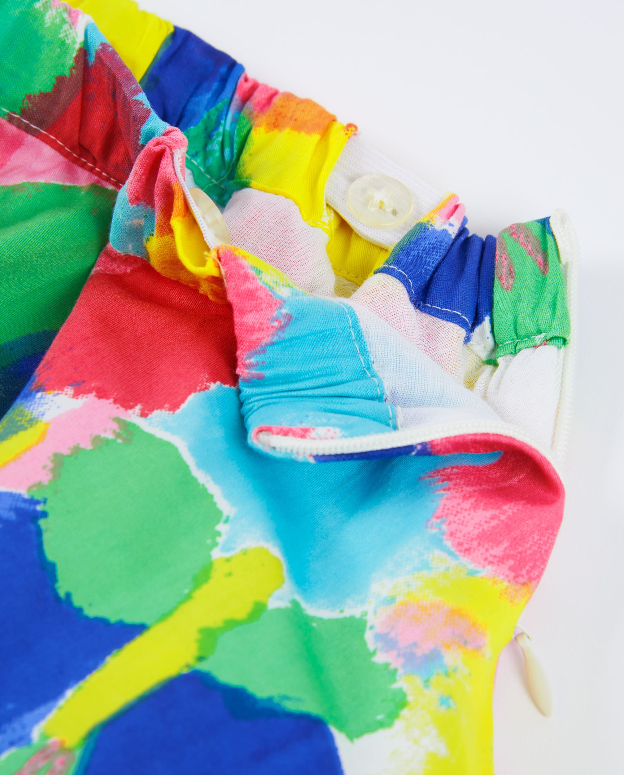 Falda de niña de plana con estampado de manchas