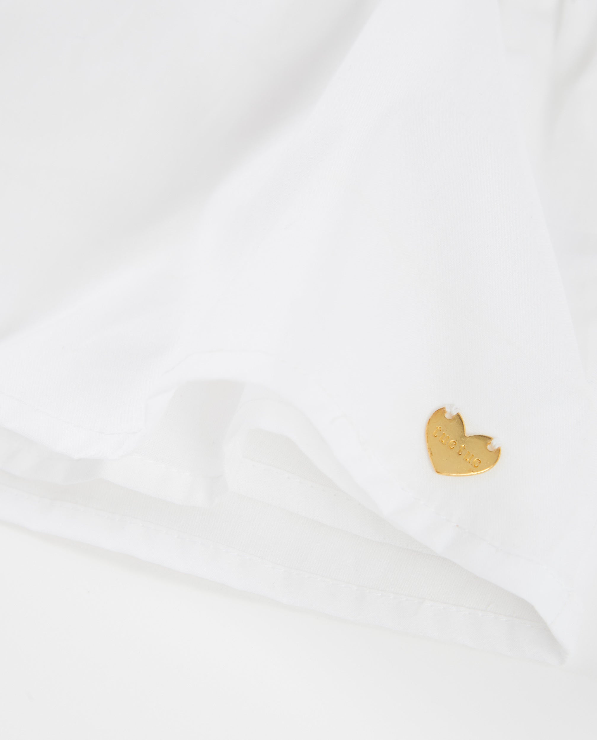 Blusa de niña de plana con aplique de flor