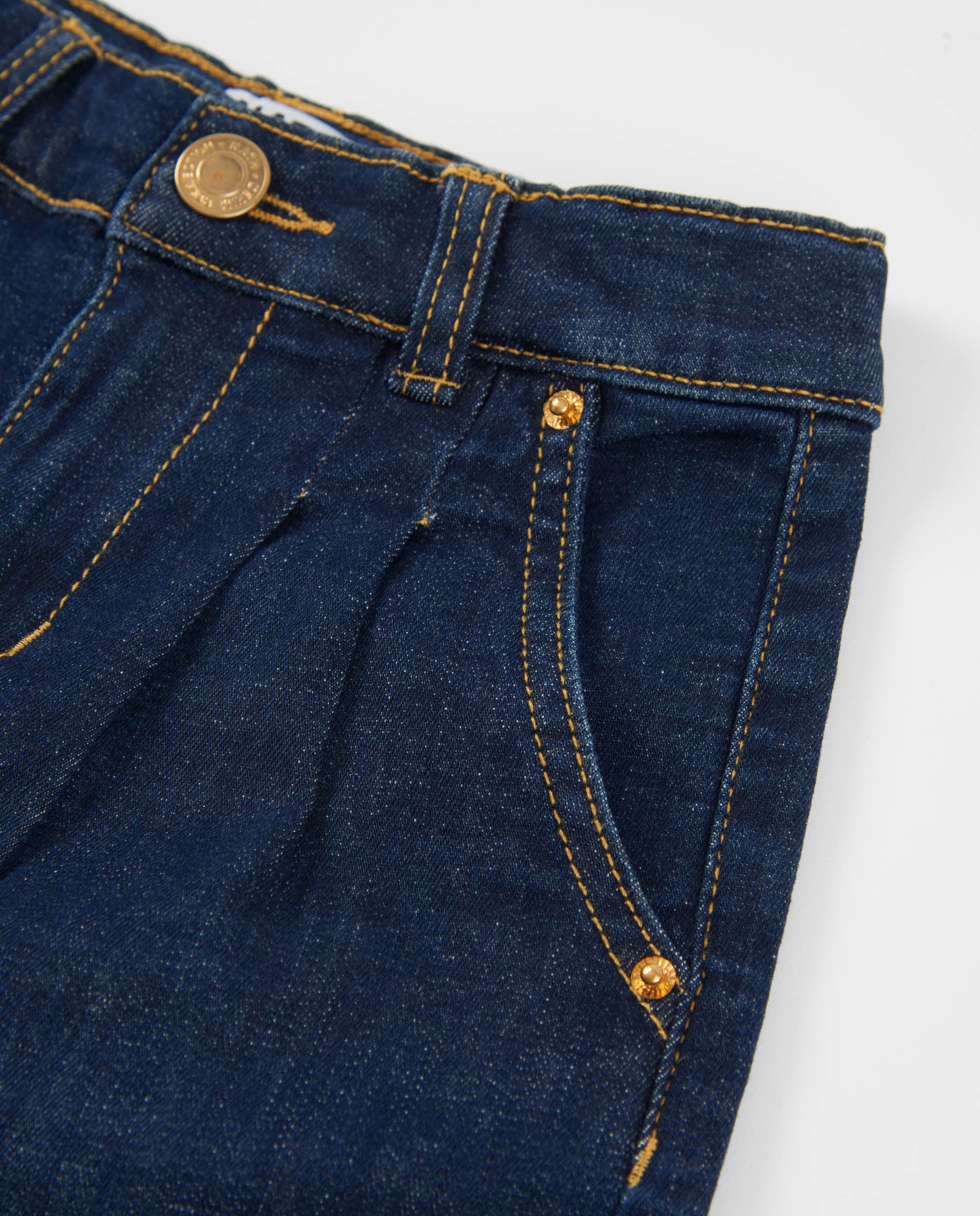 Pantalones de niña de plana y tejido denim
