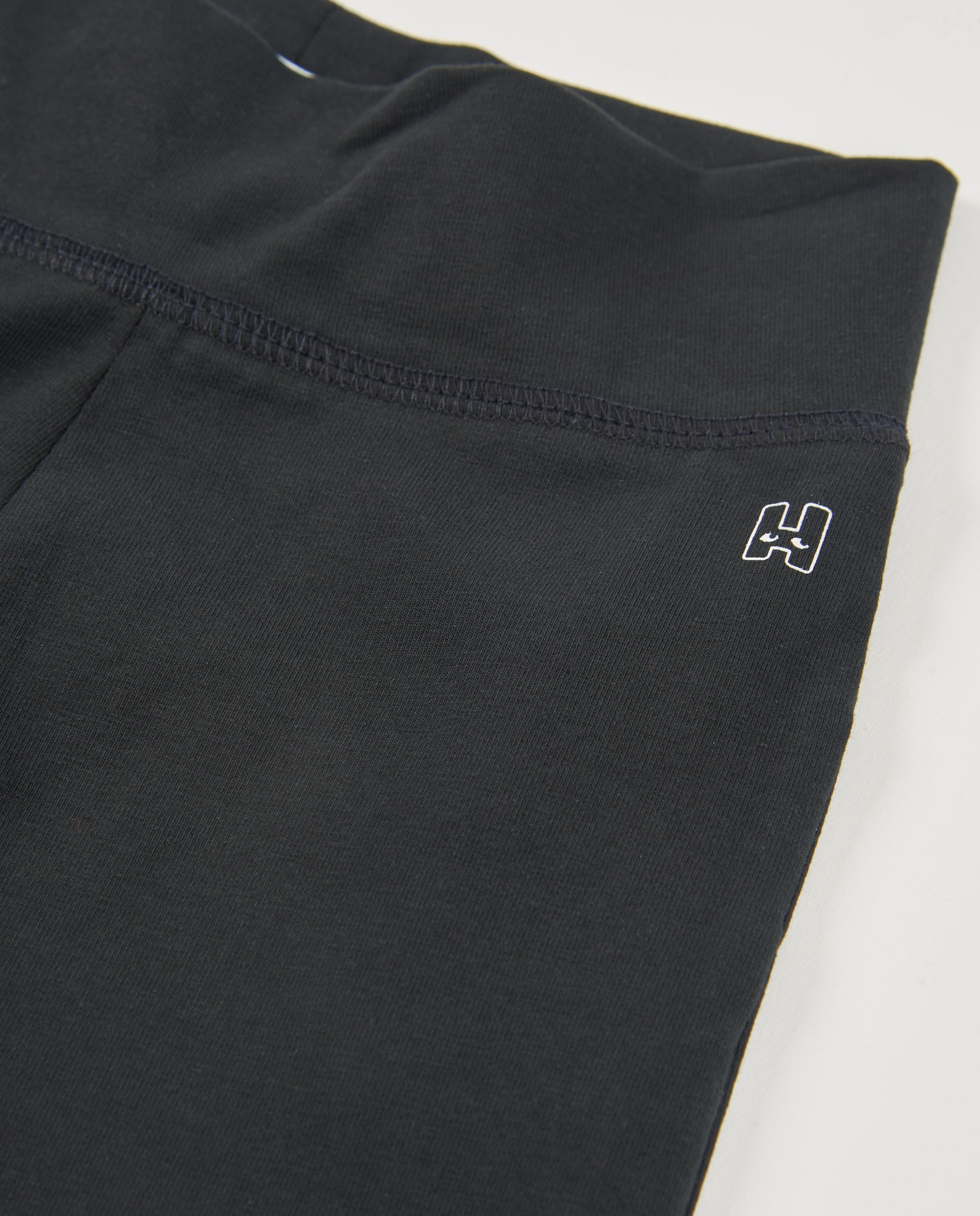 Pantalones de niña de punto y pierna acampanada
