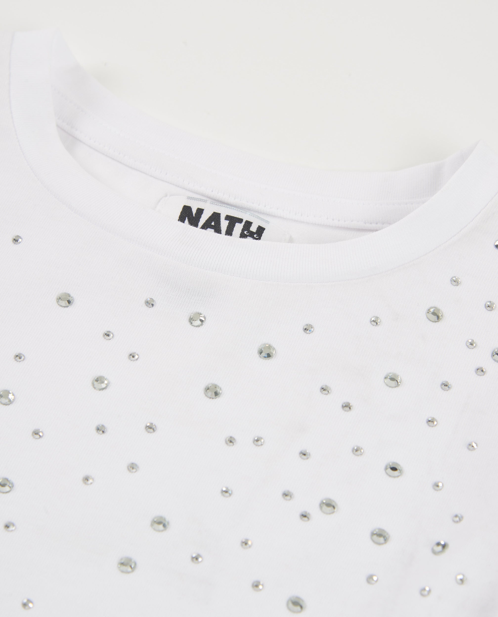 Camiseta de niña de punto con aplicaciones brillantes
