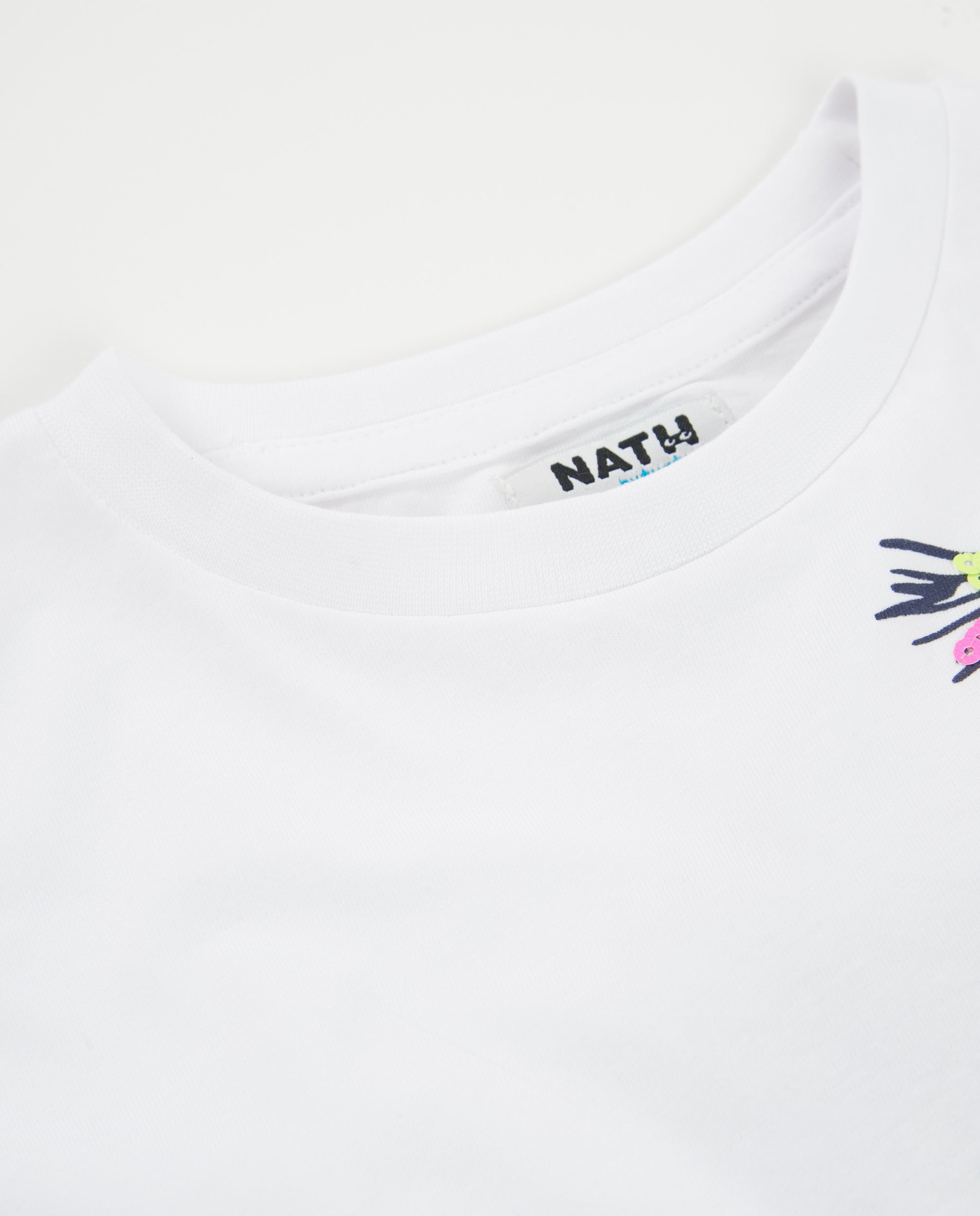 Camiseta de niña de punto con palmera lateral