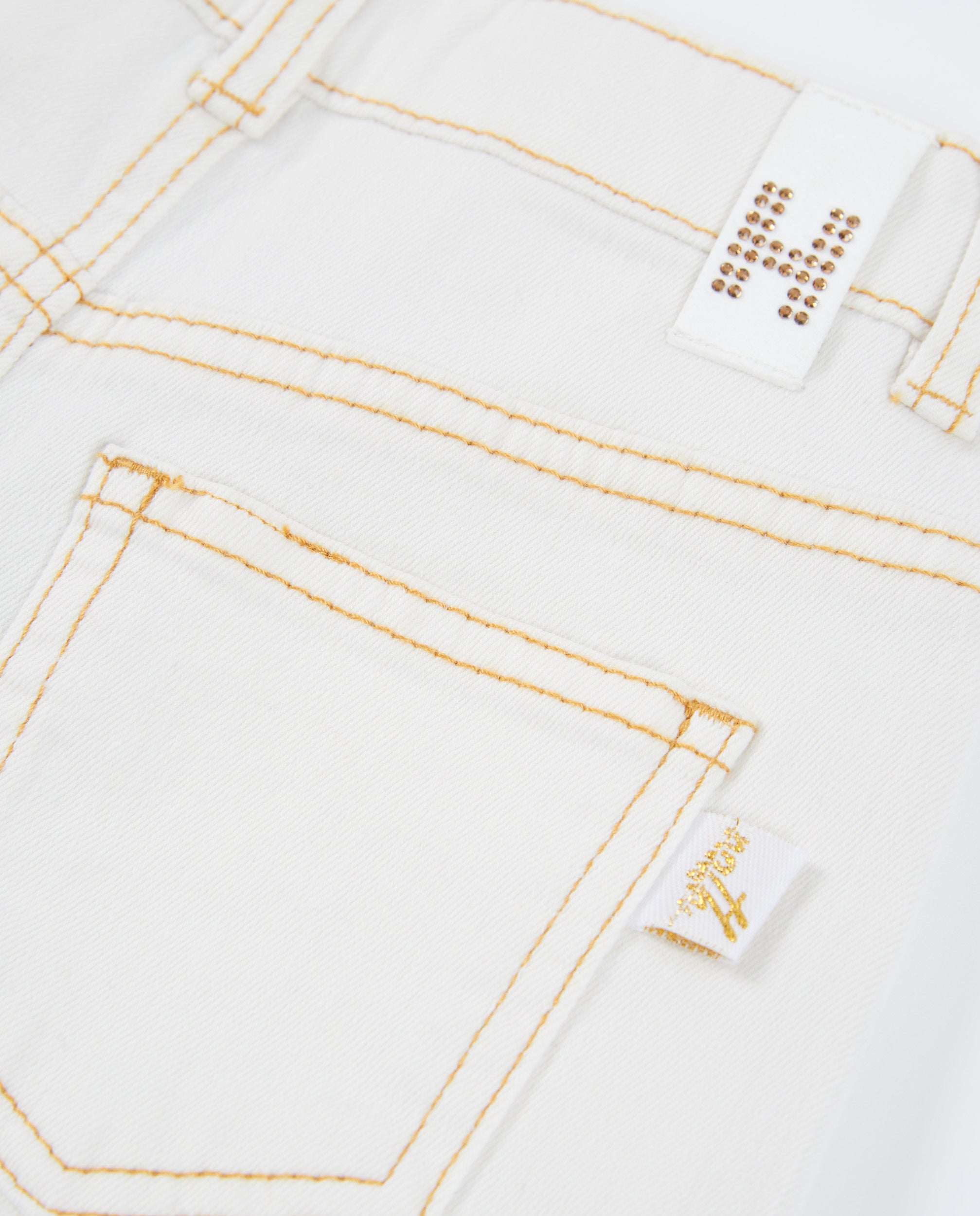Pantalones de niña de plana con pernera ancha