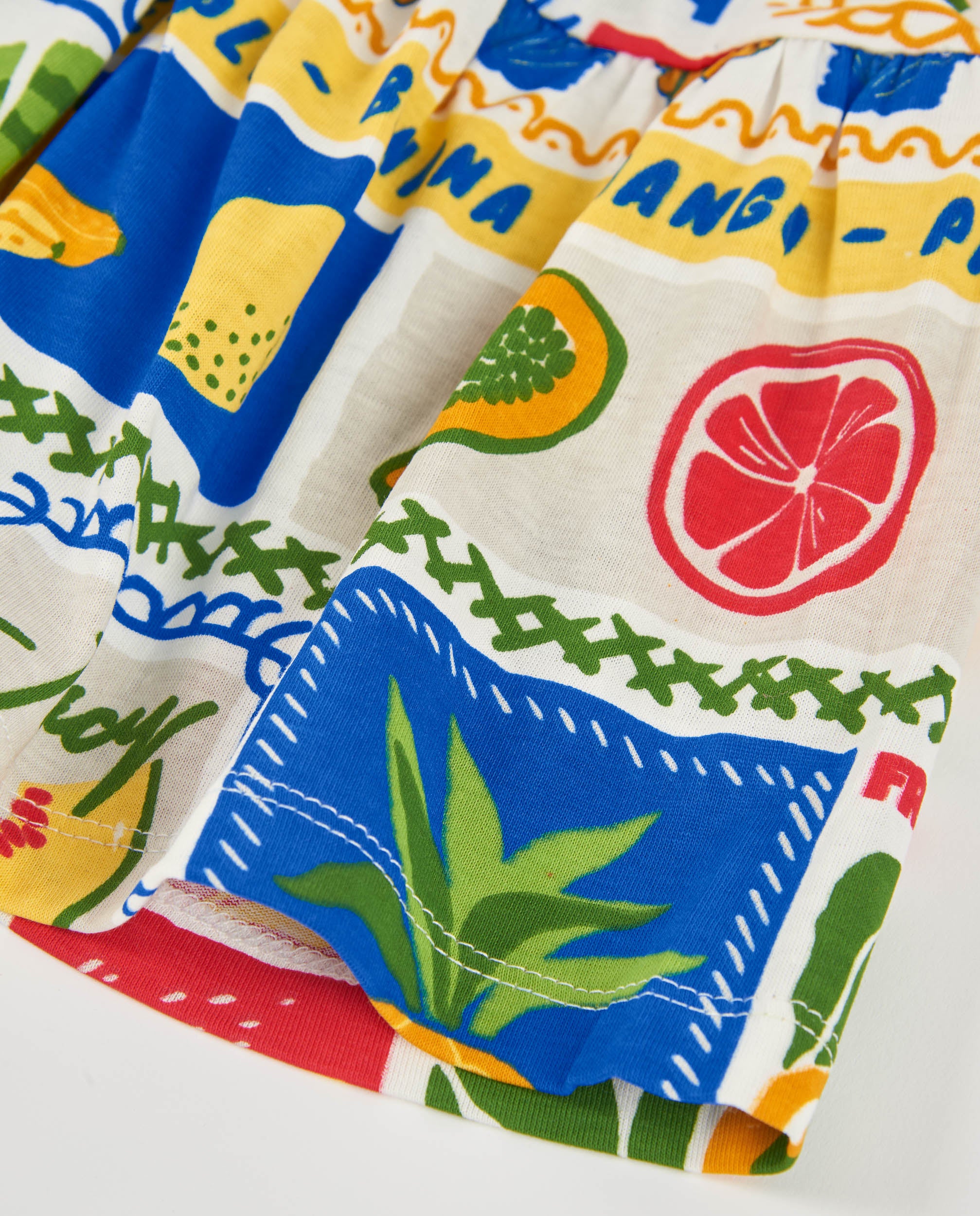 Short de niña de punto con inspiración frutal