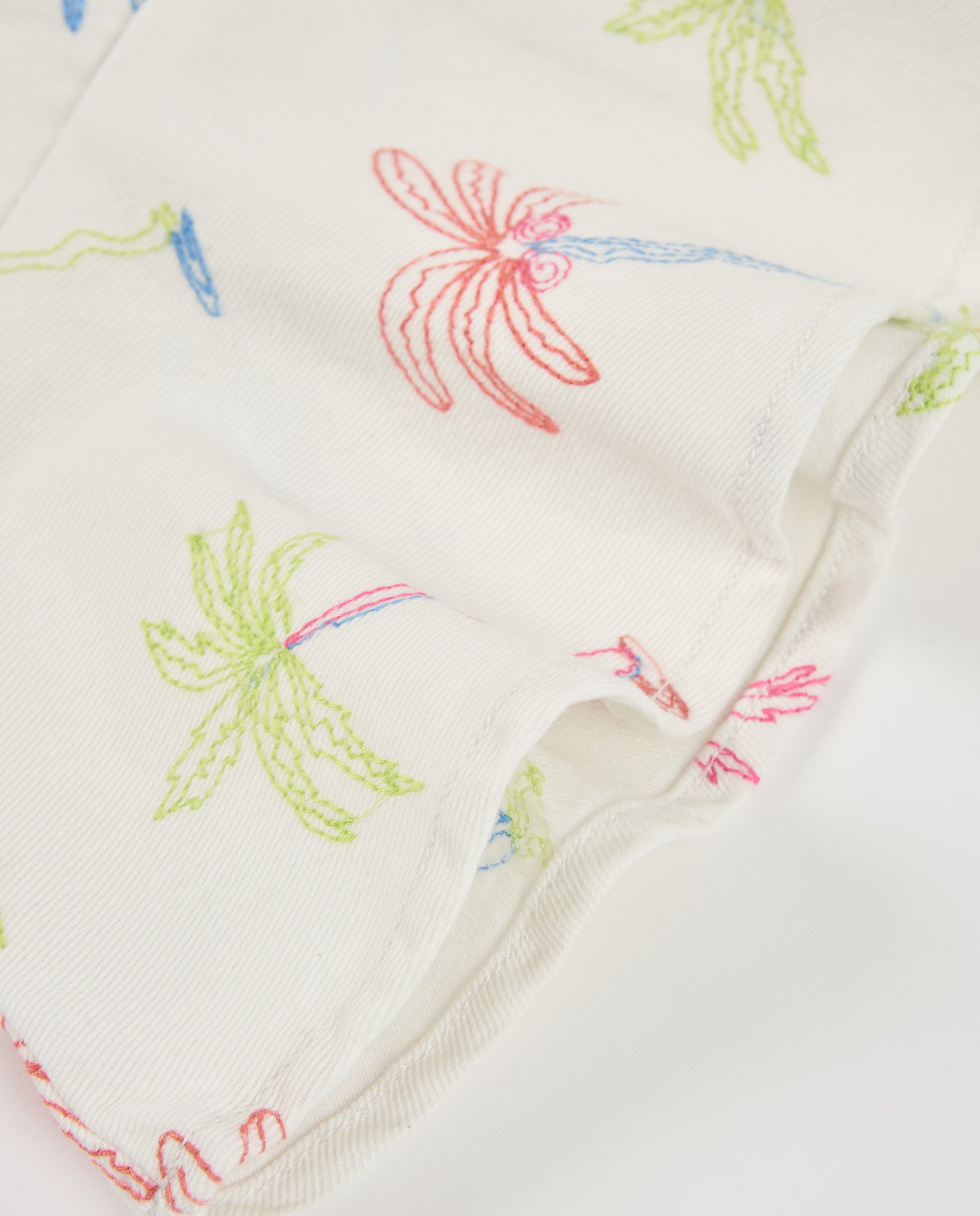 Vestido de niña de plana y estampado palmeras