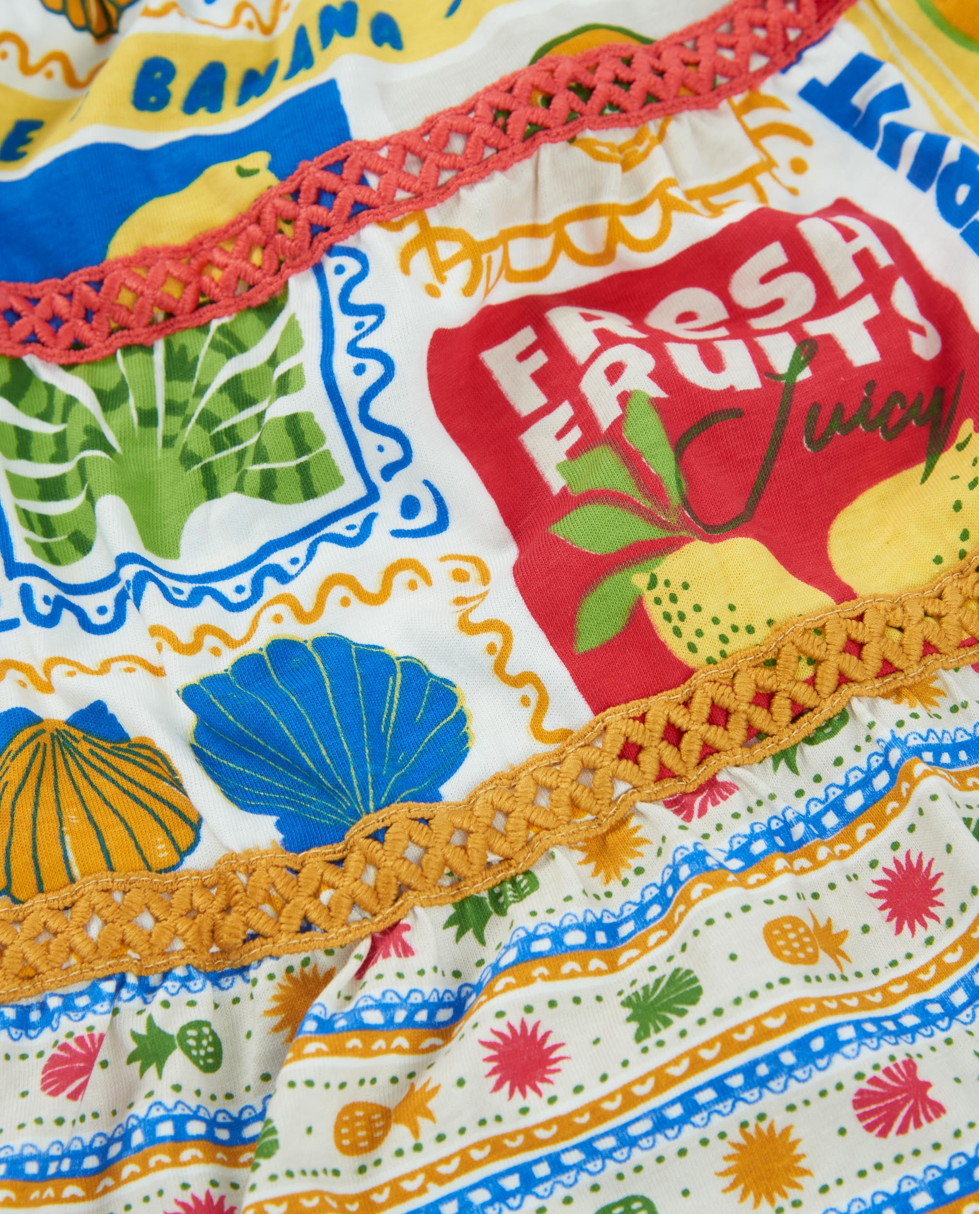 Falda de niña de punto con cintas decorativas