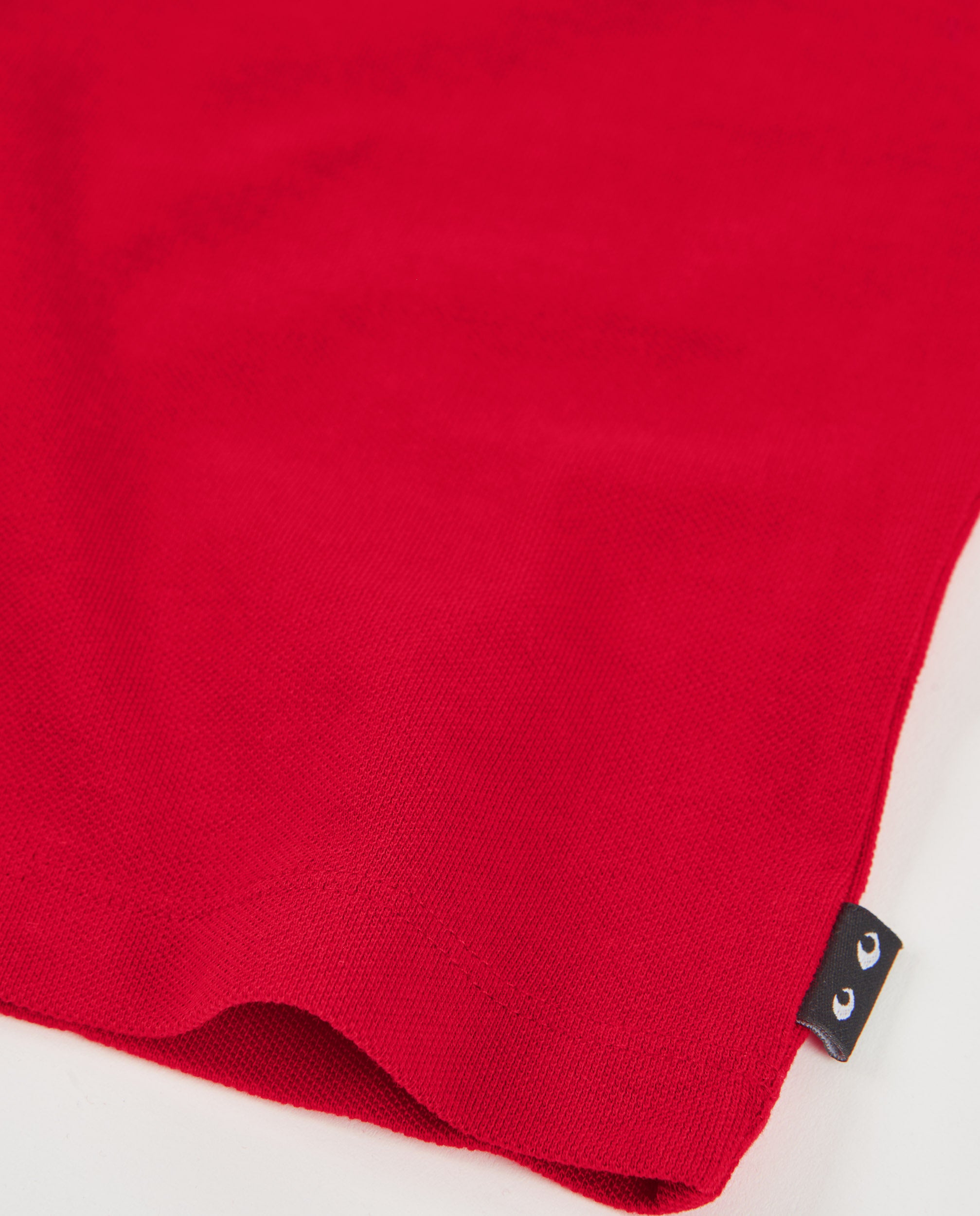 Polo de niño de punto con detalles en contraste