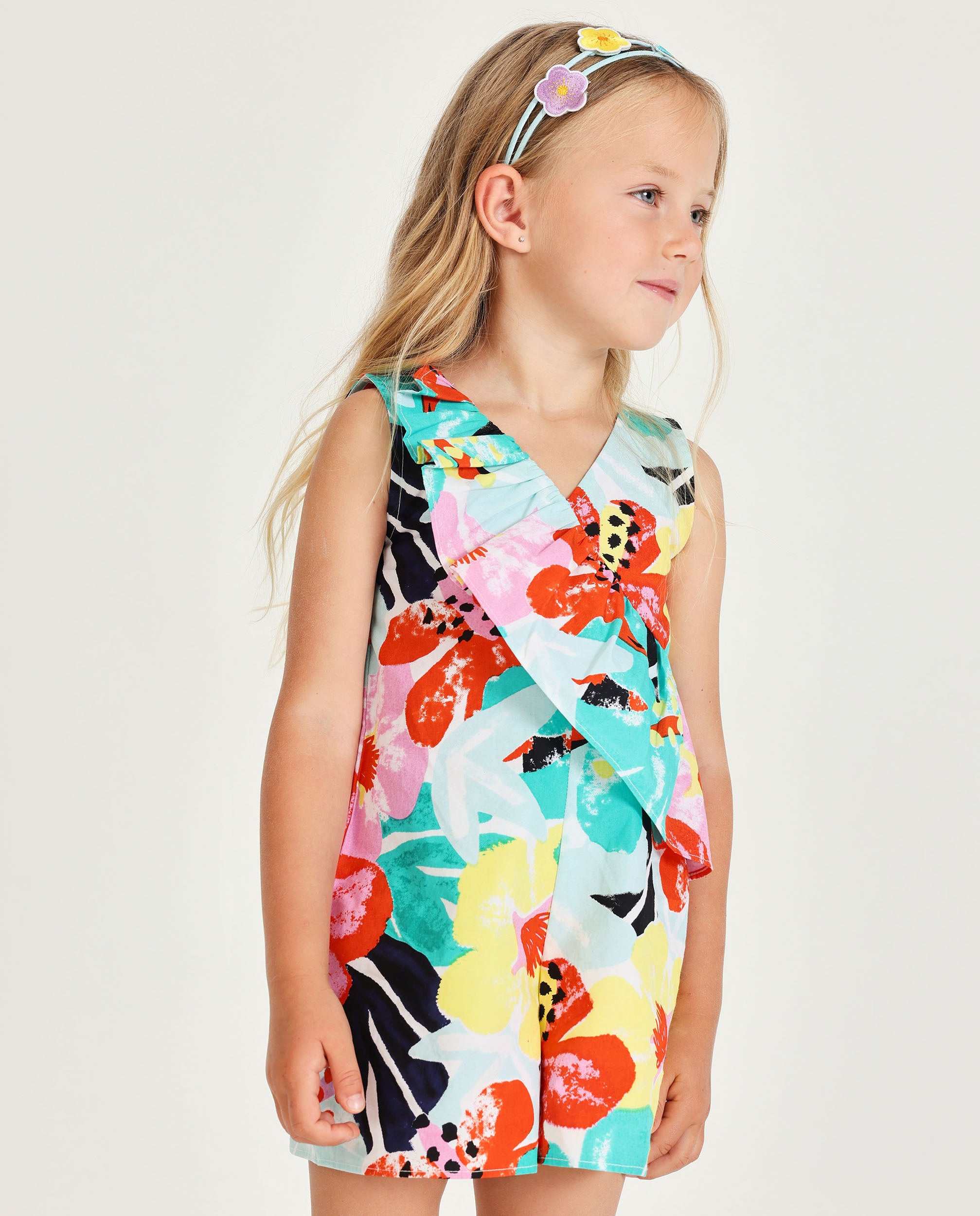 Mono corto de niña estampado floral multicolor con volante
