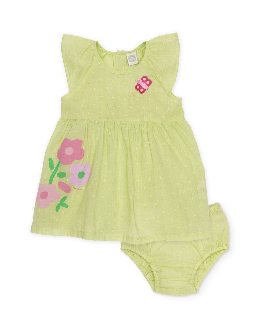Robe nouveau-né en tissu avec texture à pois