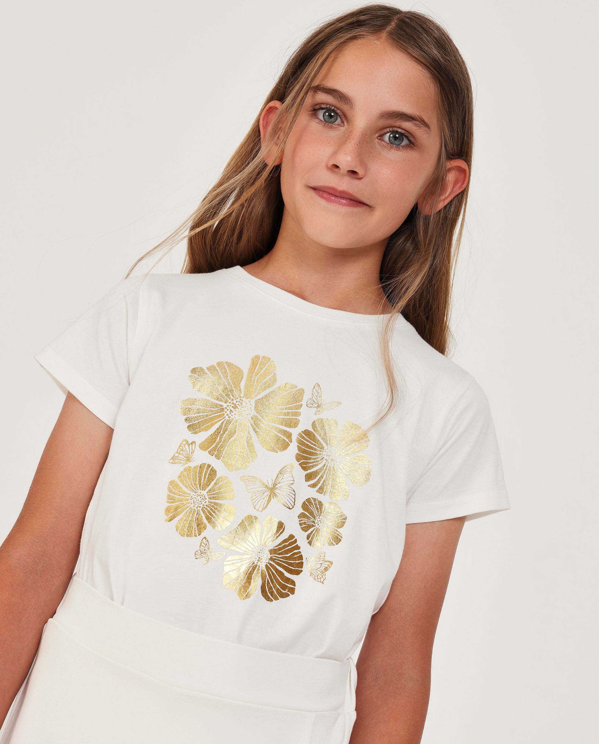 Camiseta de niña de punto con estampado dorado