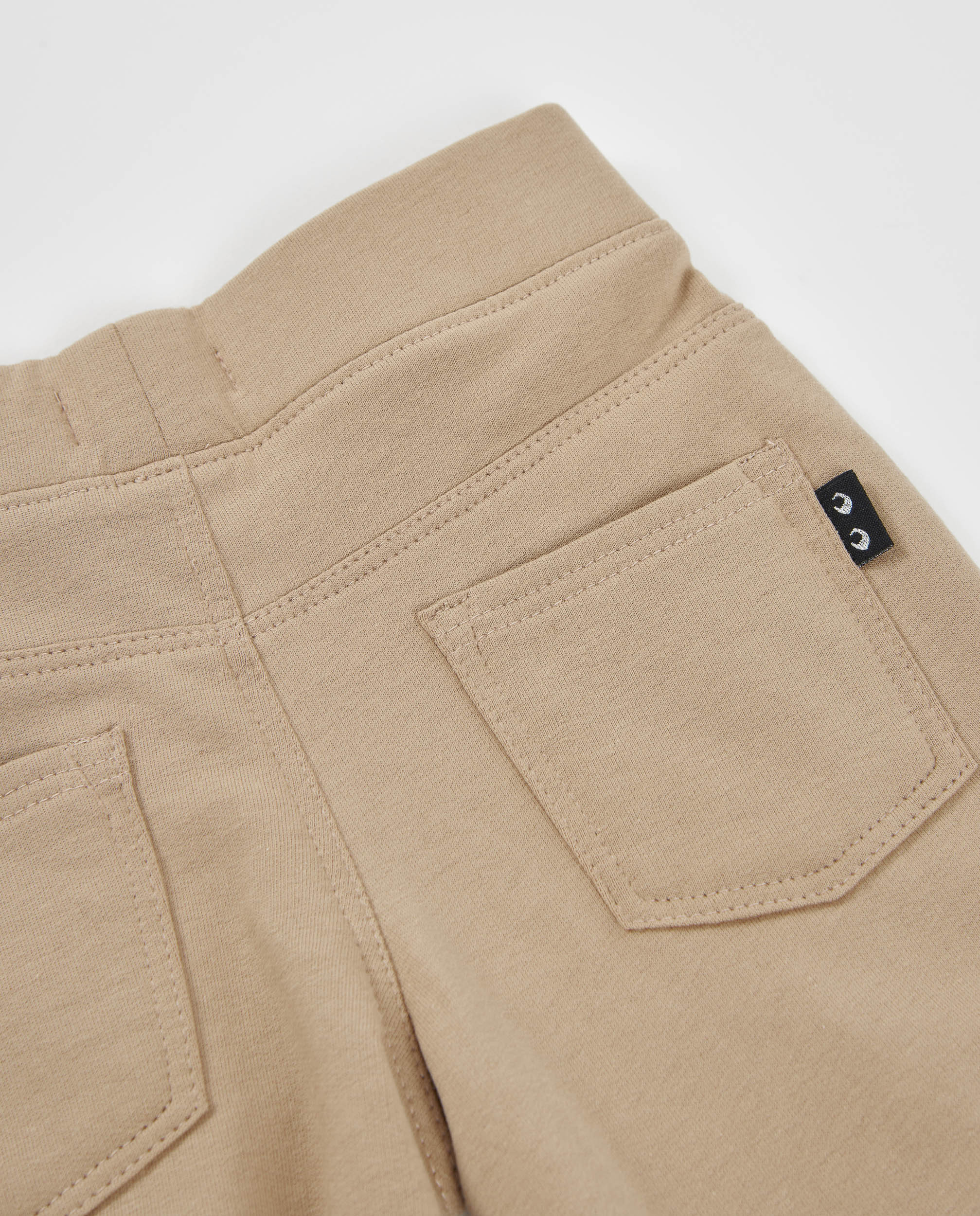Pantalón de niña de felpa con corte acampanado y tiro medio