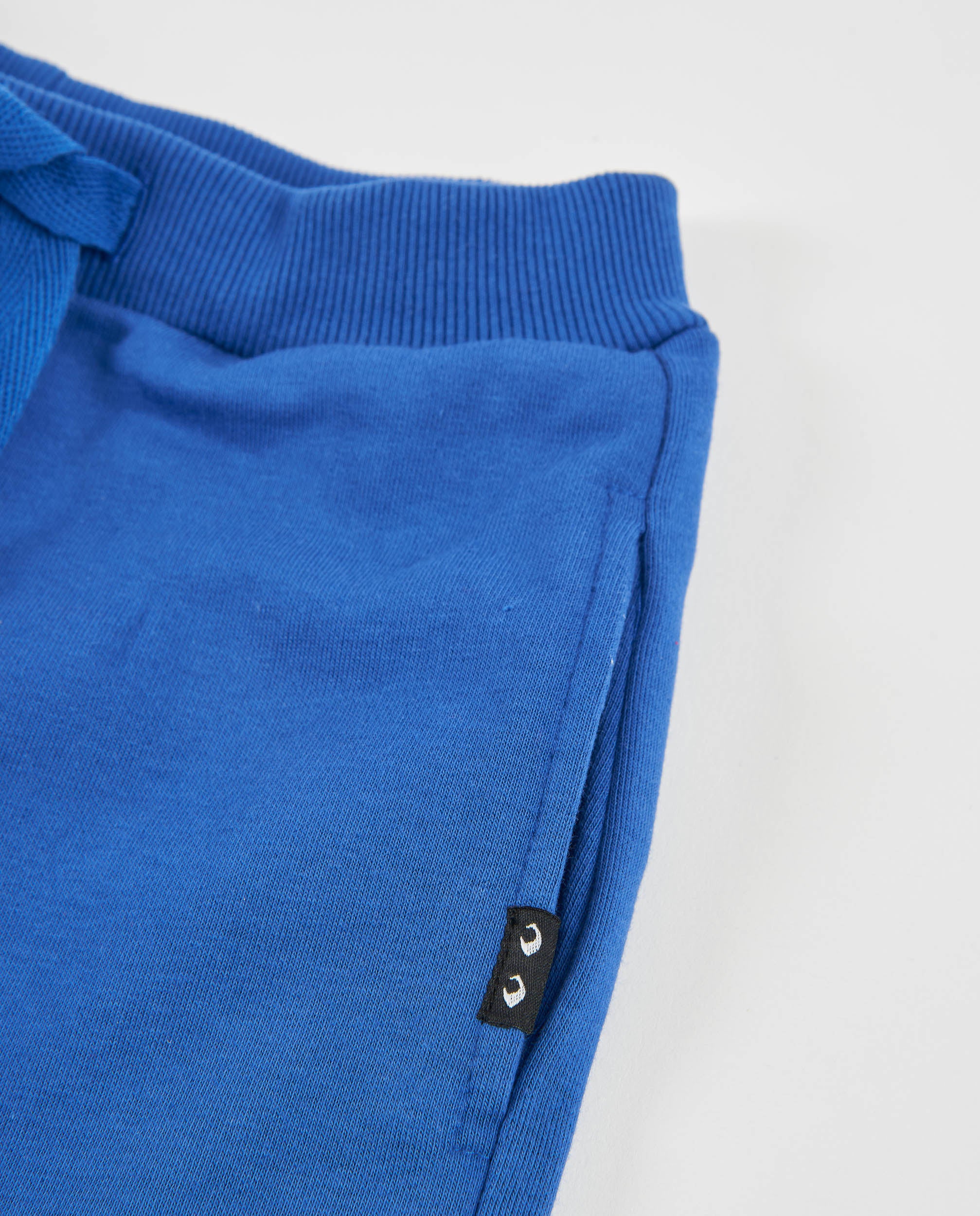 Pantalón de niño de felpa con cintura ajustable y bolsillo lateral