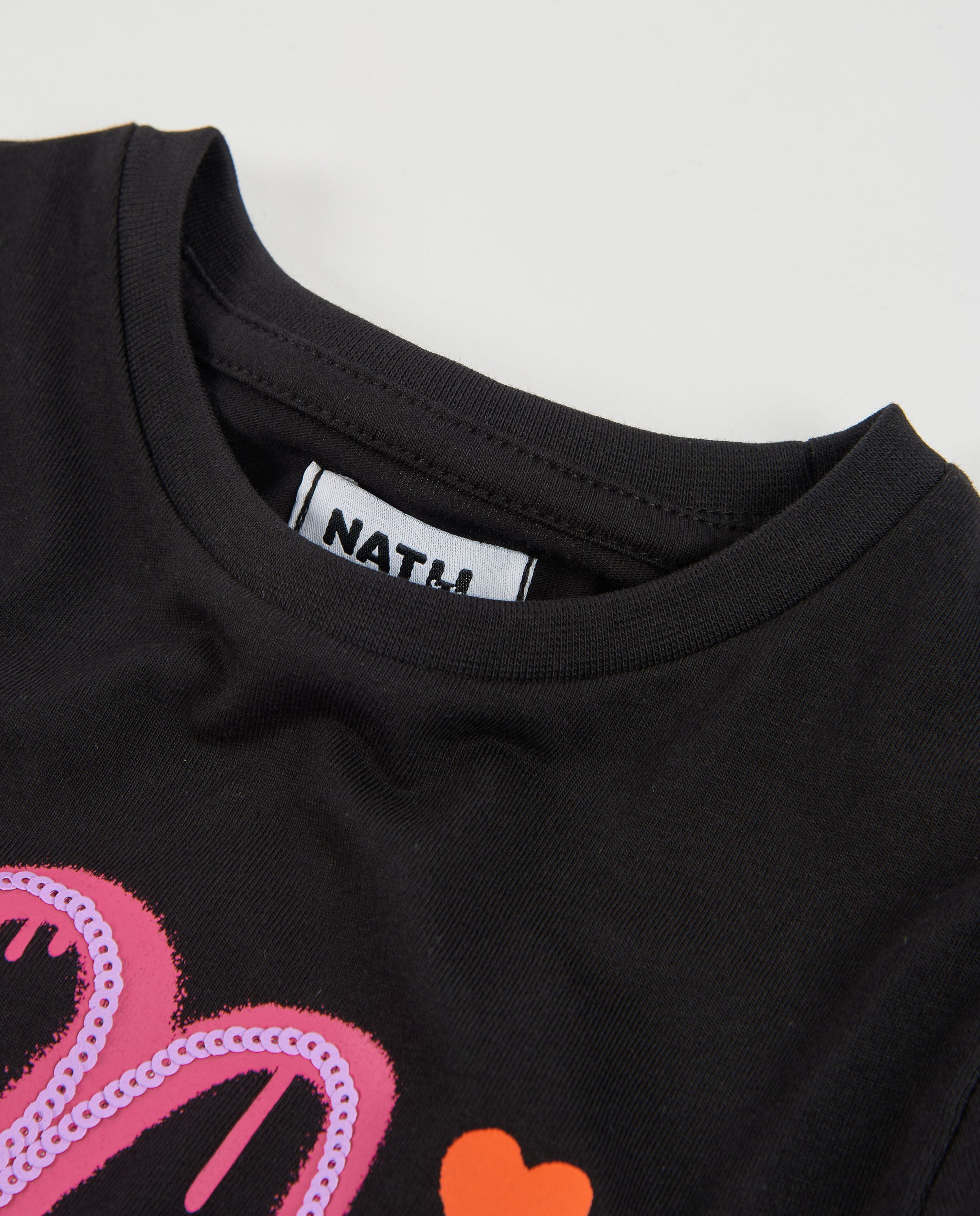 Camiseta de niña de punto con manga larga y diseño floral artístico