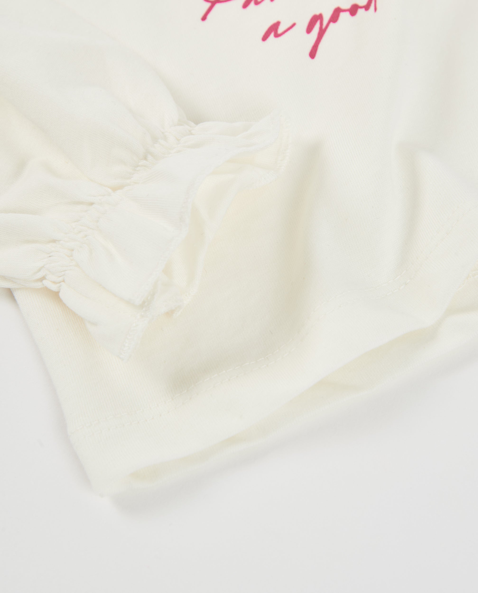 Camiseta de niña de punto con ilustración parisina y lazo decorativo