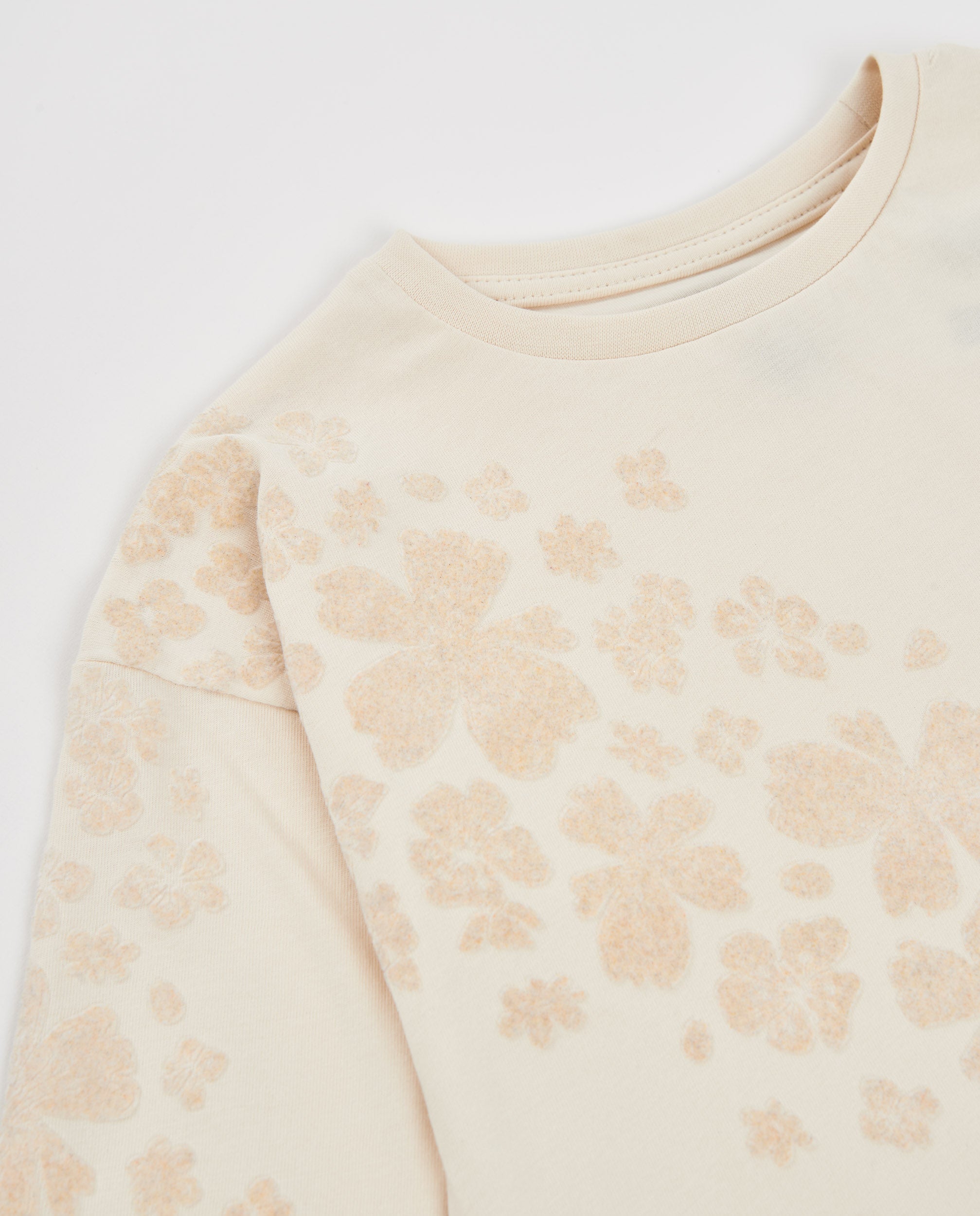 Camiseta de niña de punto con manga larga y estampado floral delicado