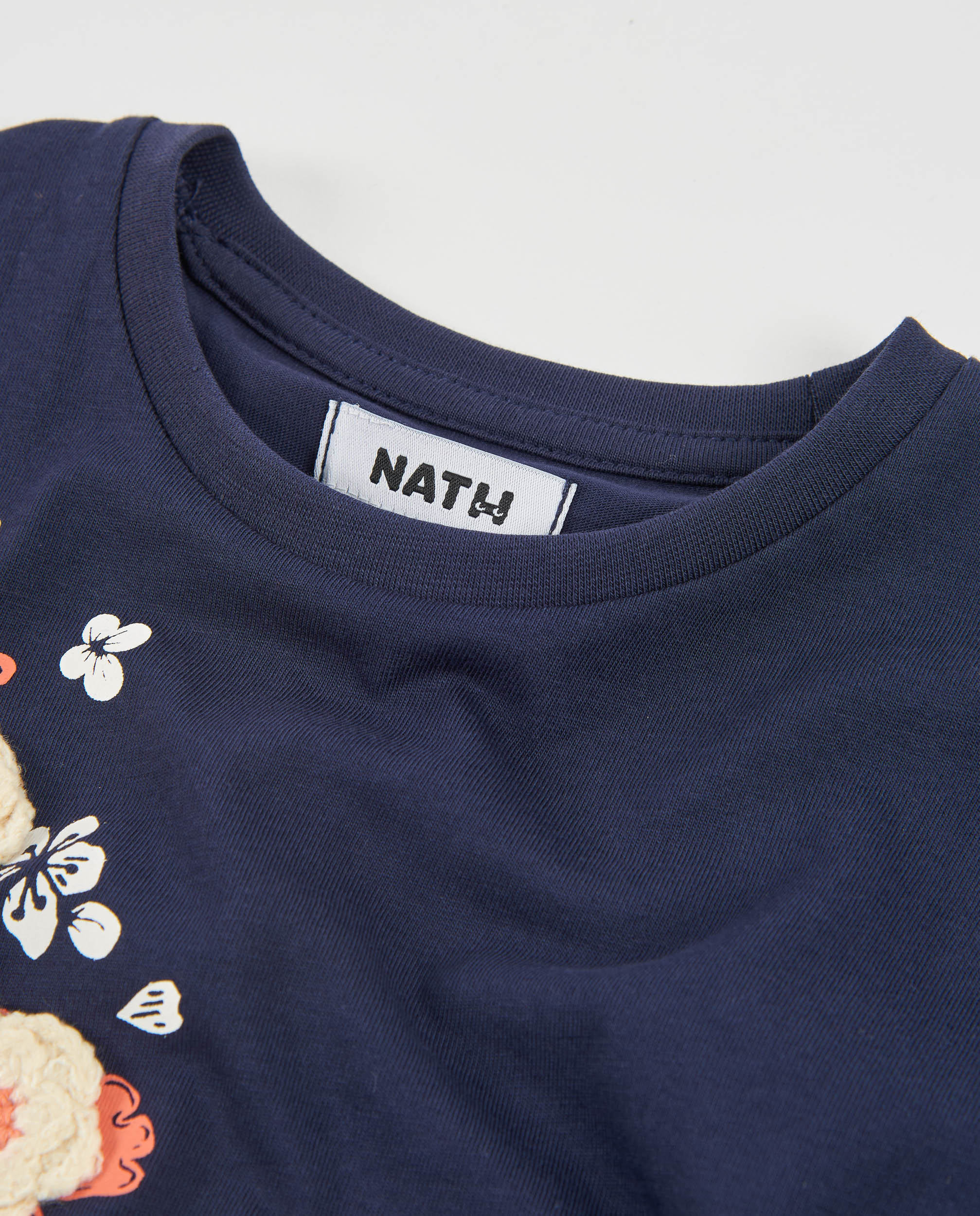 Camiseta de niña de punto con estampado floral en lateral