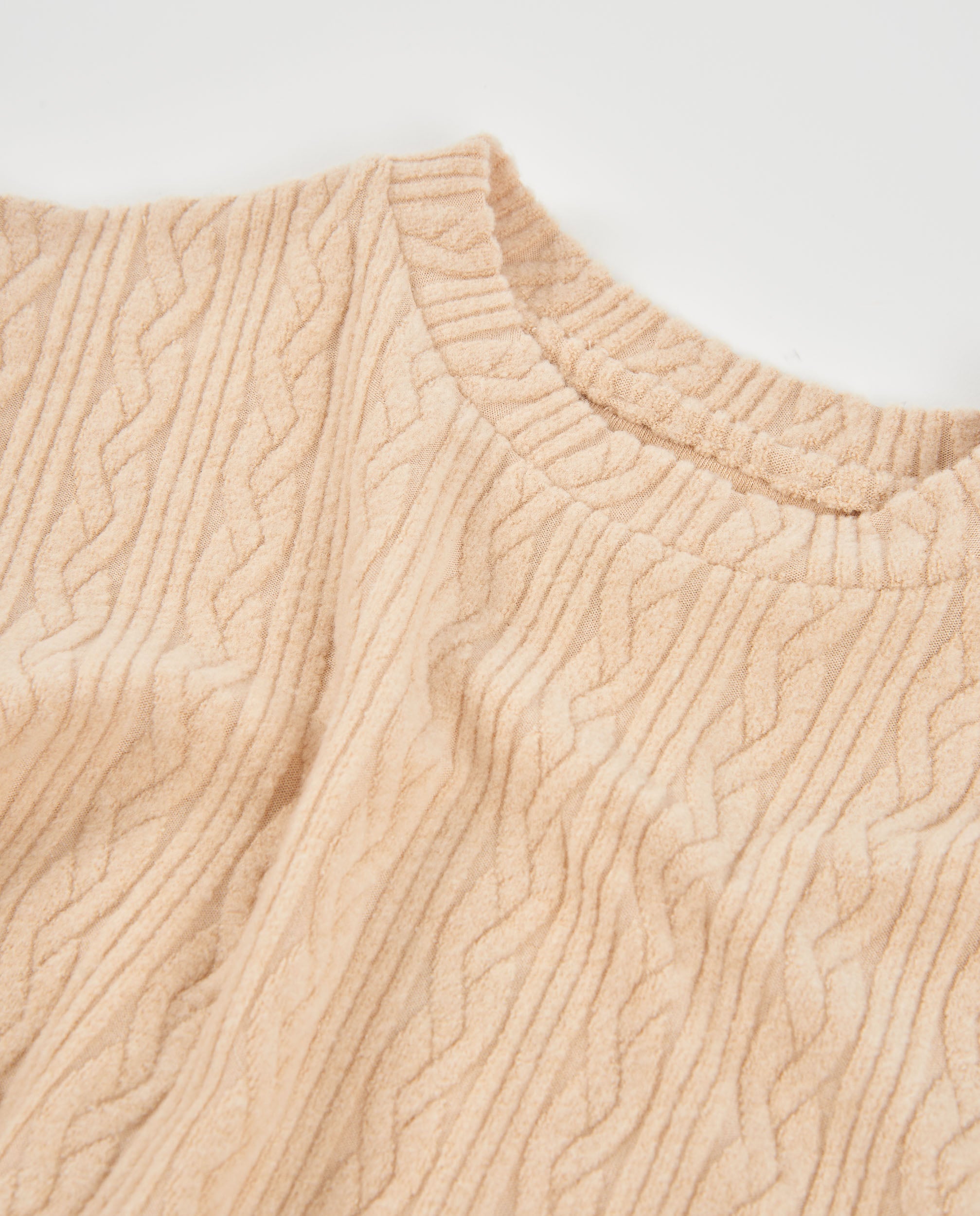 Jersey de niña de tricot con corte holgado y tono beige