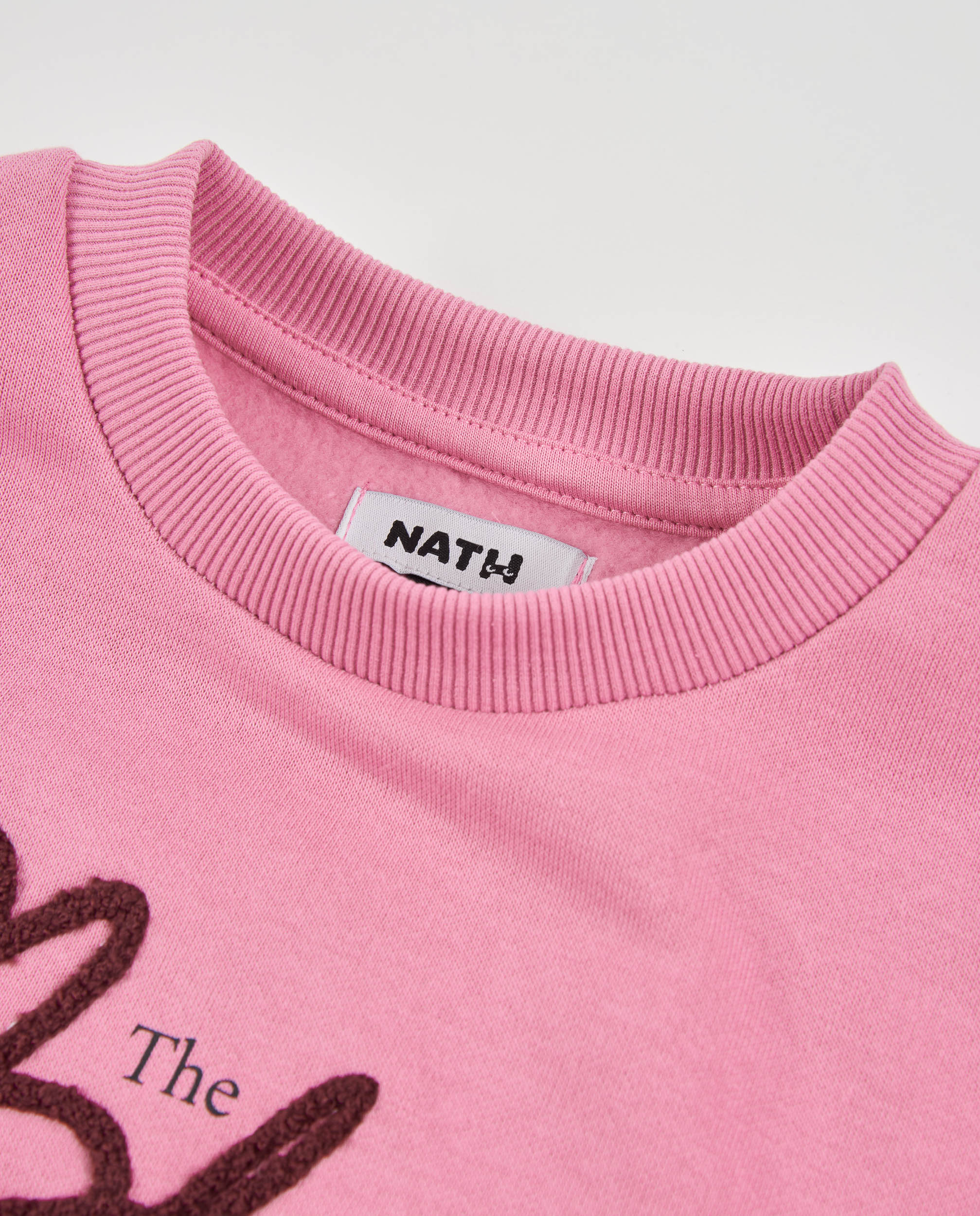 Sudadera de niña de felpa con logo bordado y puños acanalados