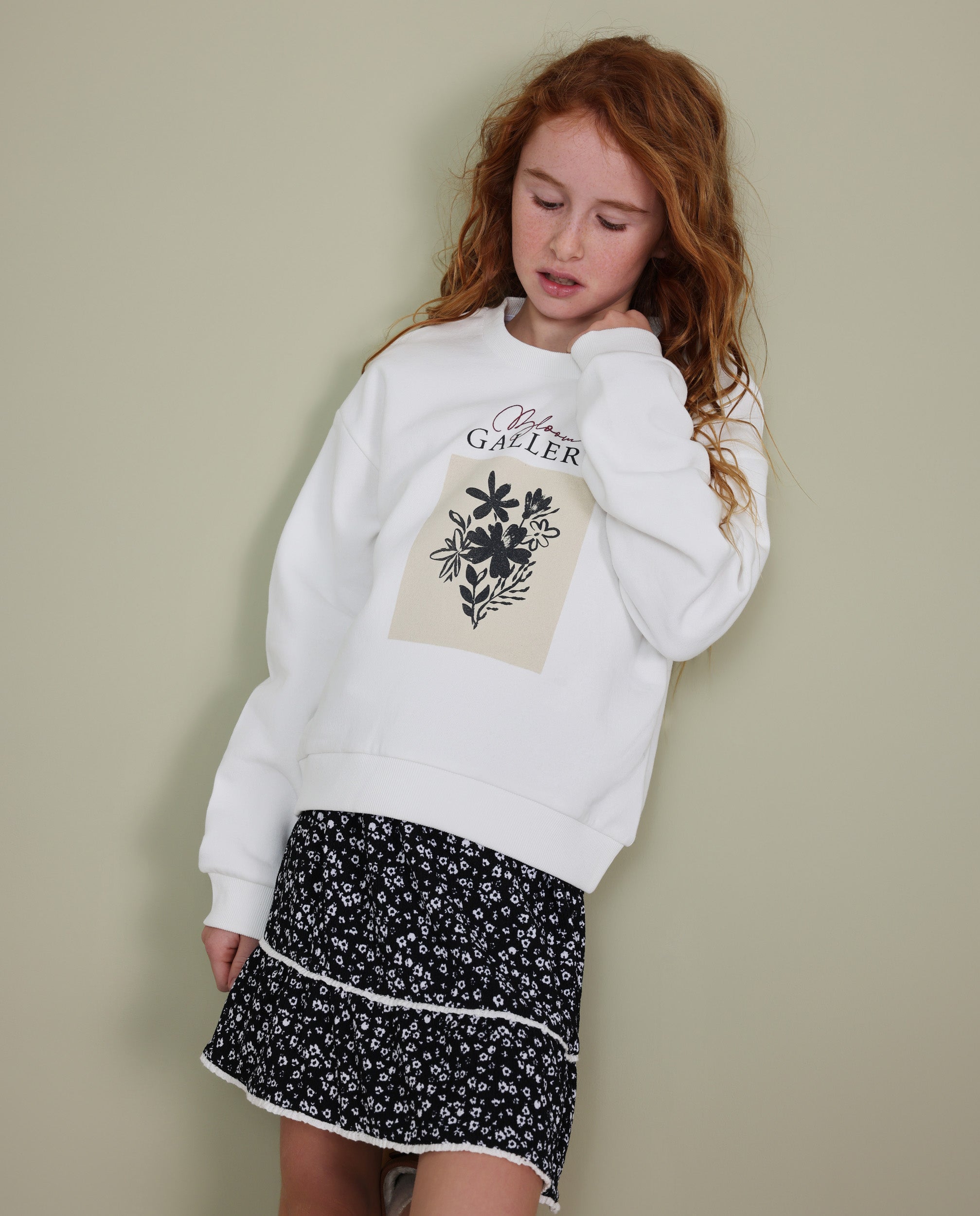 Falda de niña de tela plana con diseño floral y volantes