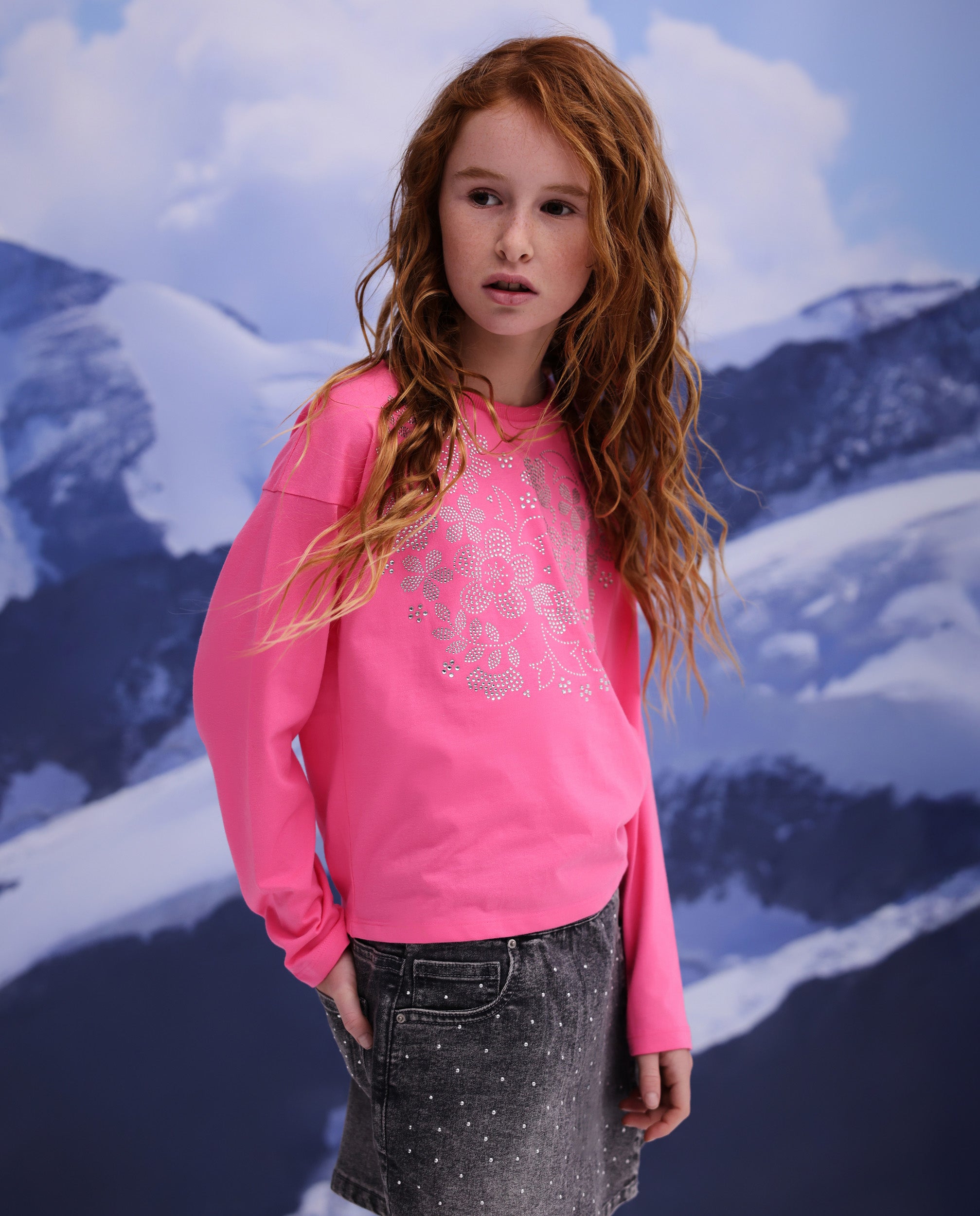Camiseta de niña de punto con estampado floral brillante