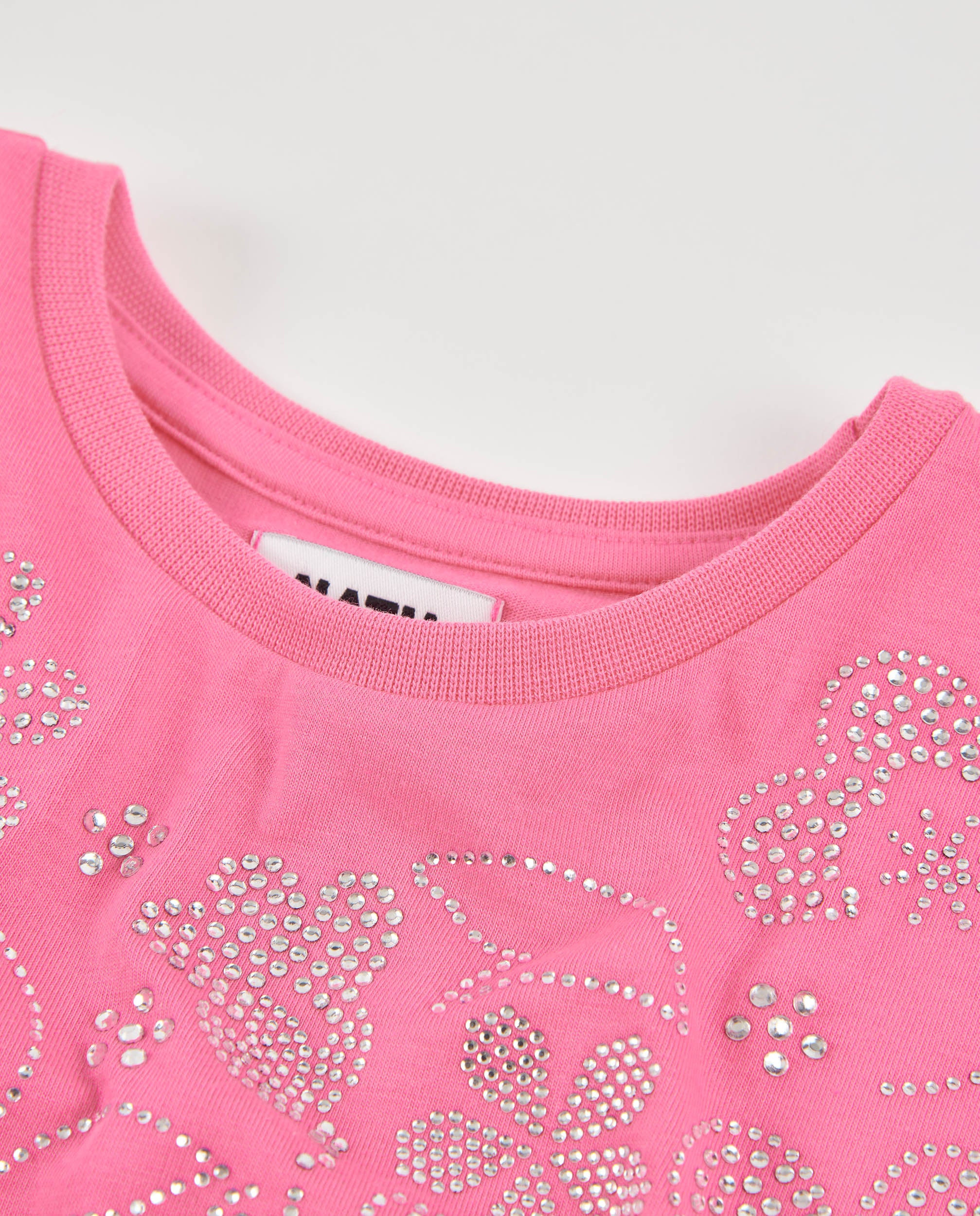 Camiseta de niña de punto con estampado floral brillante
