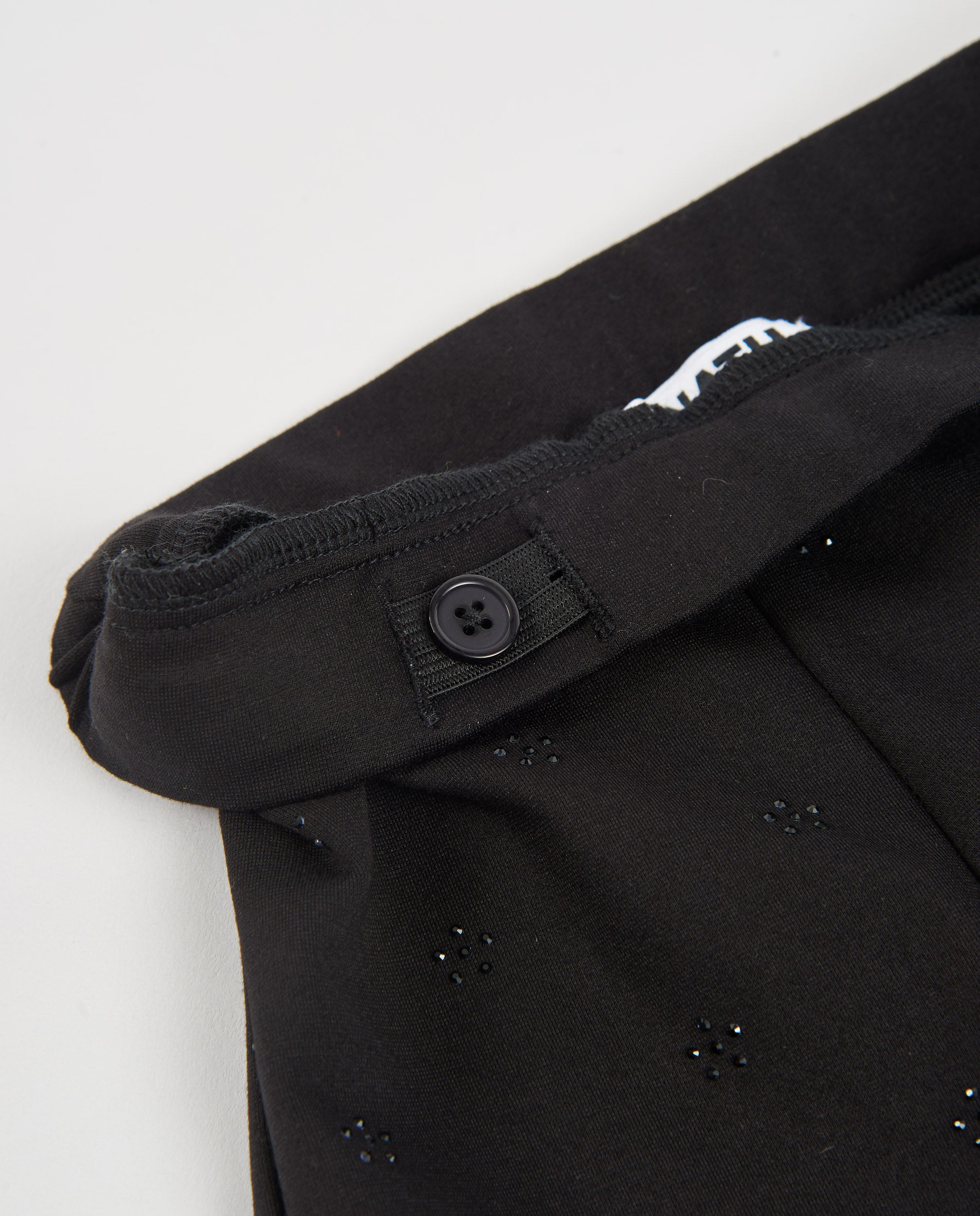 Pantalón de niña de punto con corte recto y decorado sutil