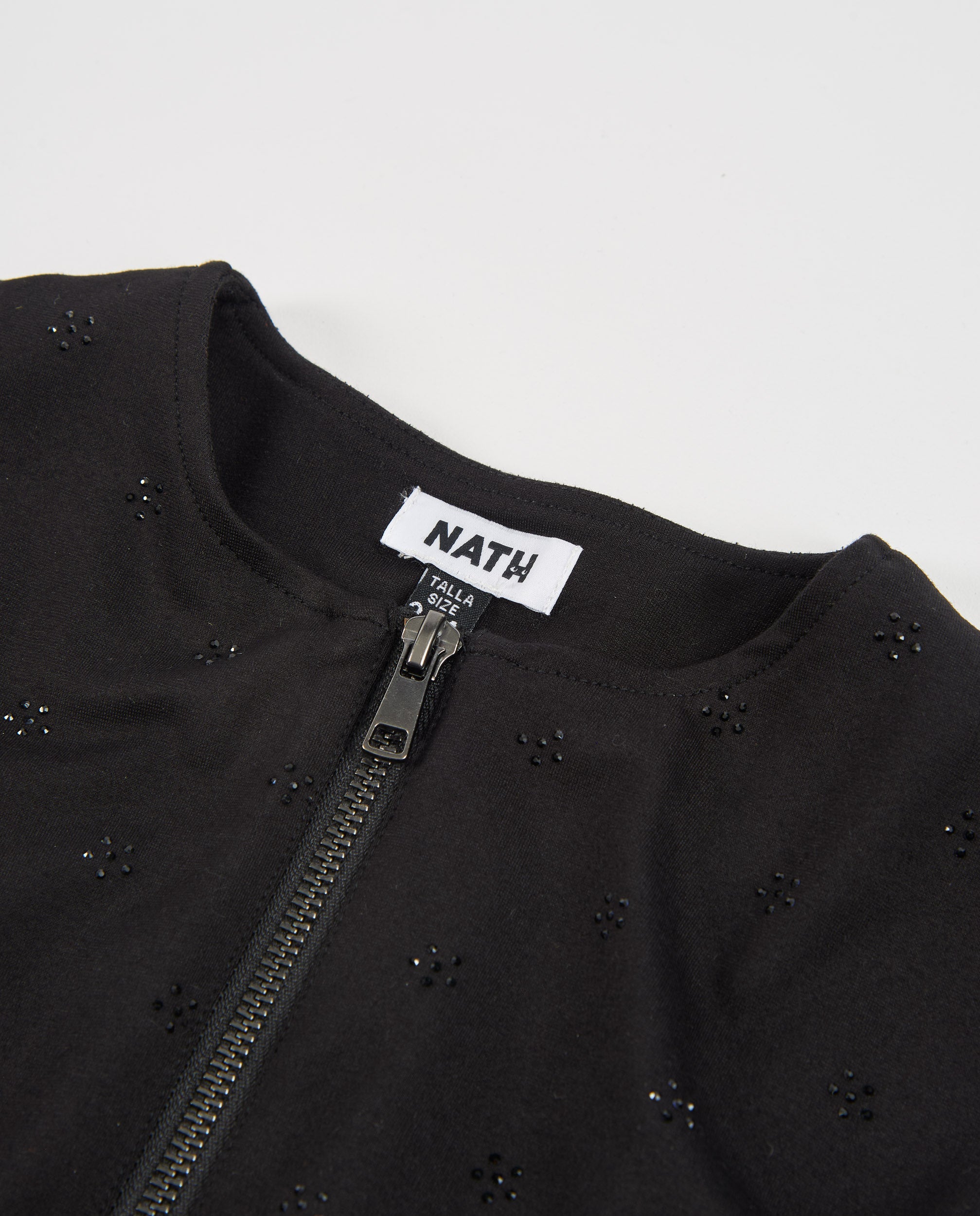 Cazadora bomber de niña de punto con detalle floral